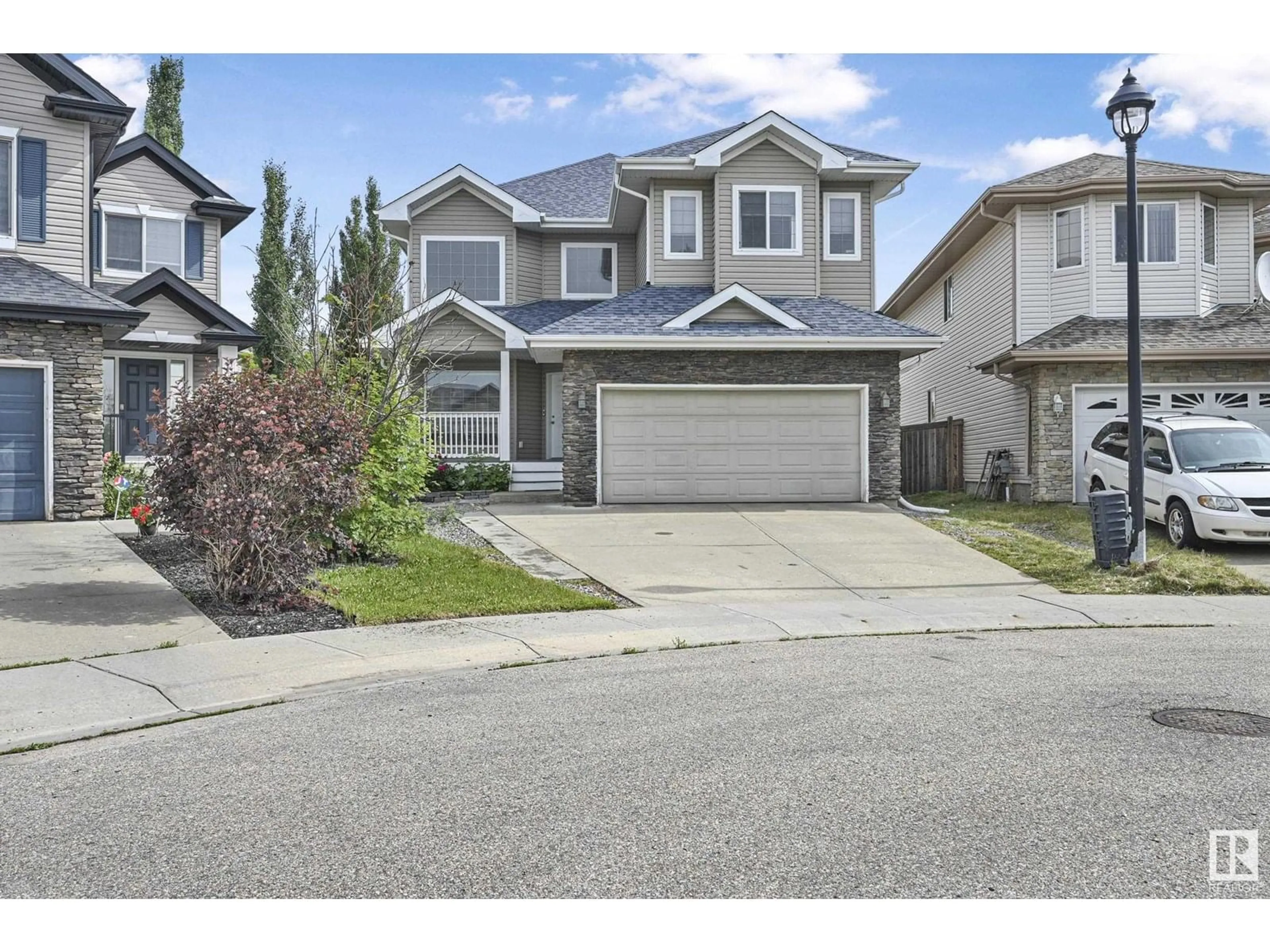 Home with vinyl exterior material, street for 6350 SANDIN WY, Edmonton Alberta T6R0K1