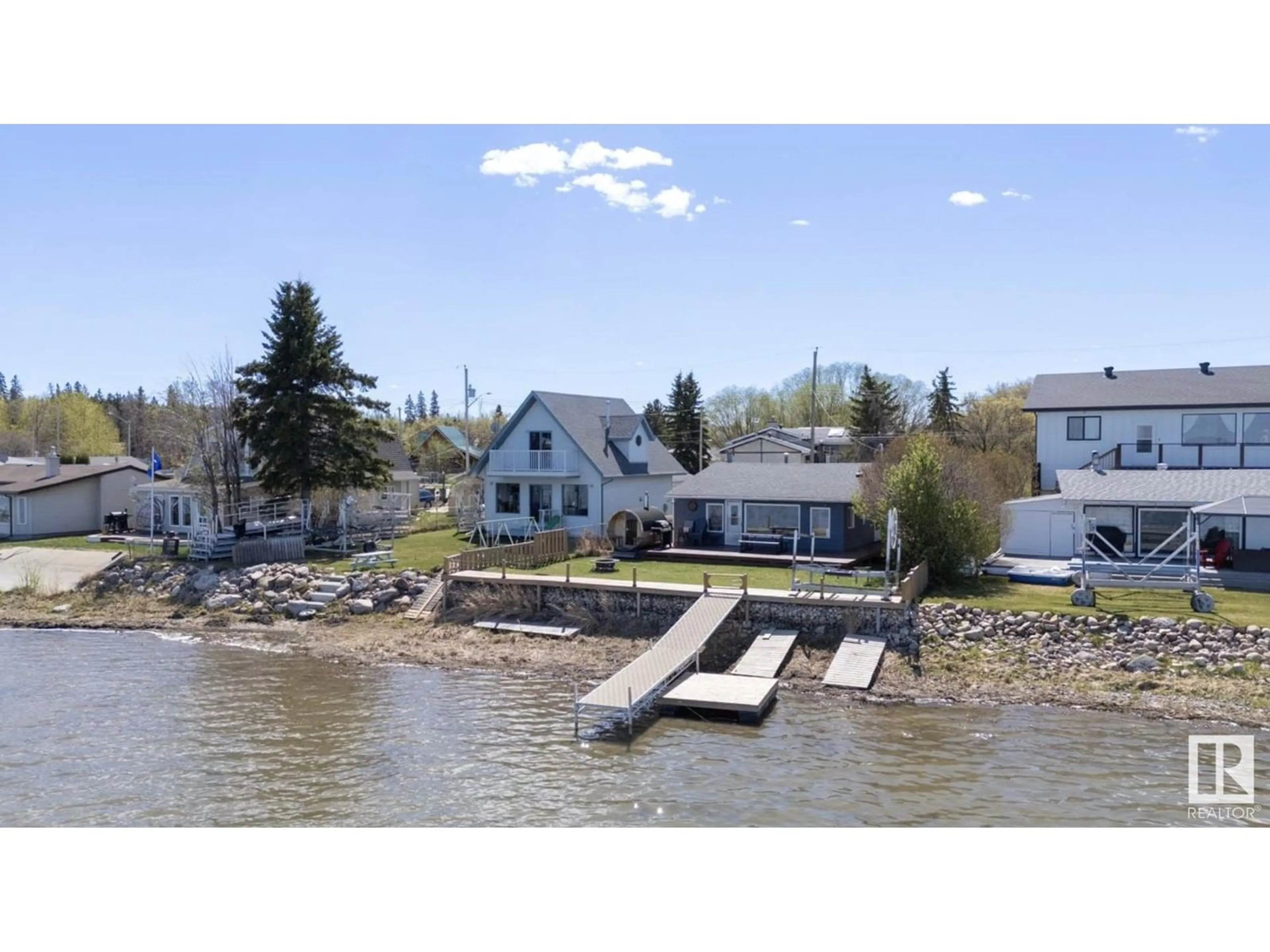 A pic from outside/outdoor area/front of a property/back of a property/a pic from drone, water/lake/river/ocean view for 6330 STE ANNE TRAIL, Rural Lac Ste. Anne County Alberta T0E0A0
