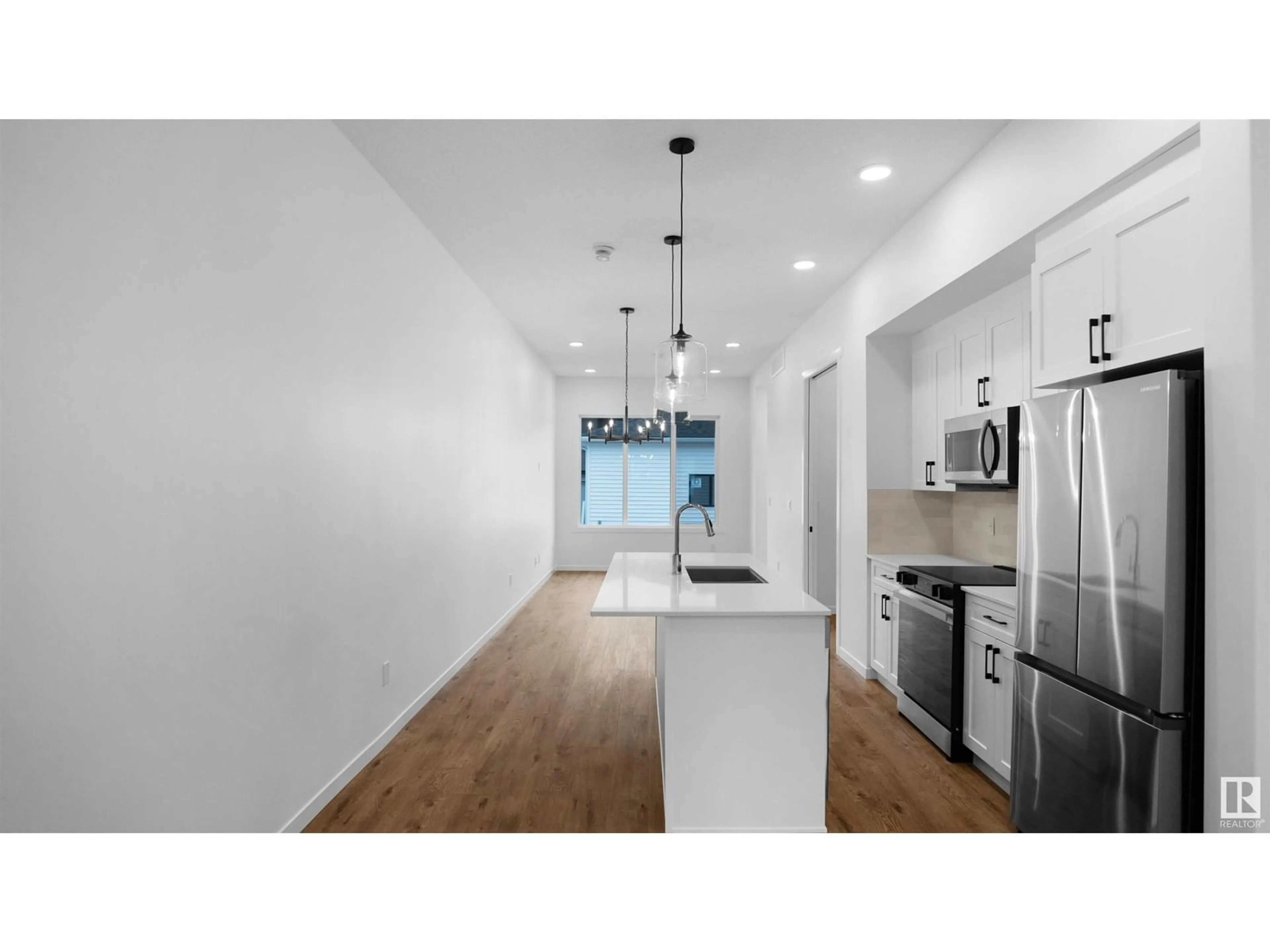 Open concept kitchen, unknown for NW - 20609 42 AV, Edmonton Alberta T6M0R8