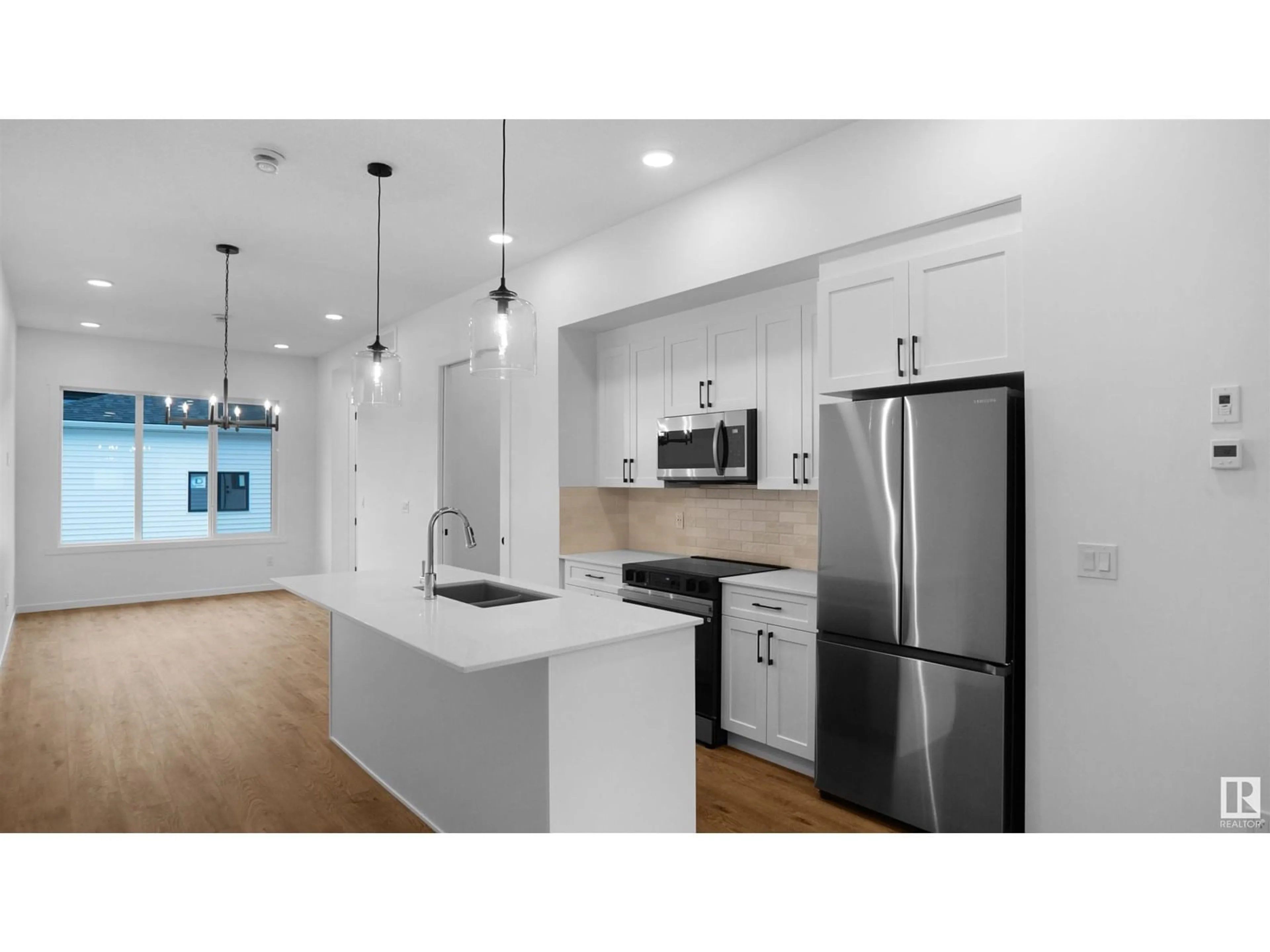 Open concept kitchen, unknown for NW - 20609 42 AV, Edmonton Alberta T6M0R8