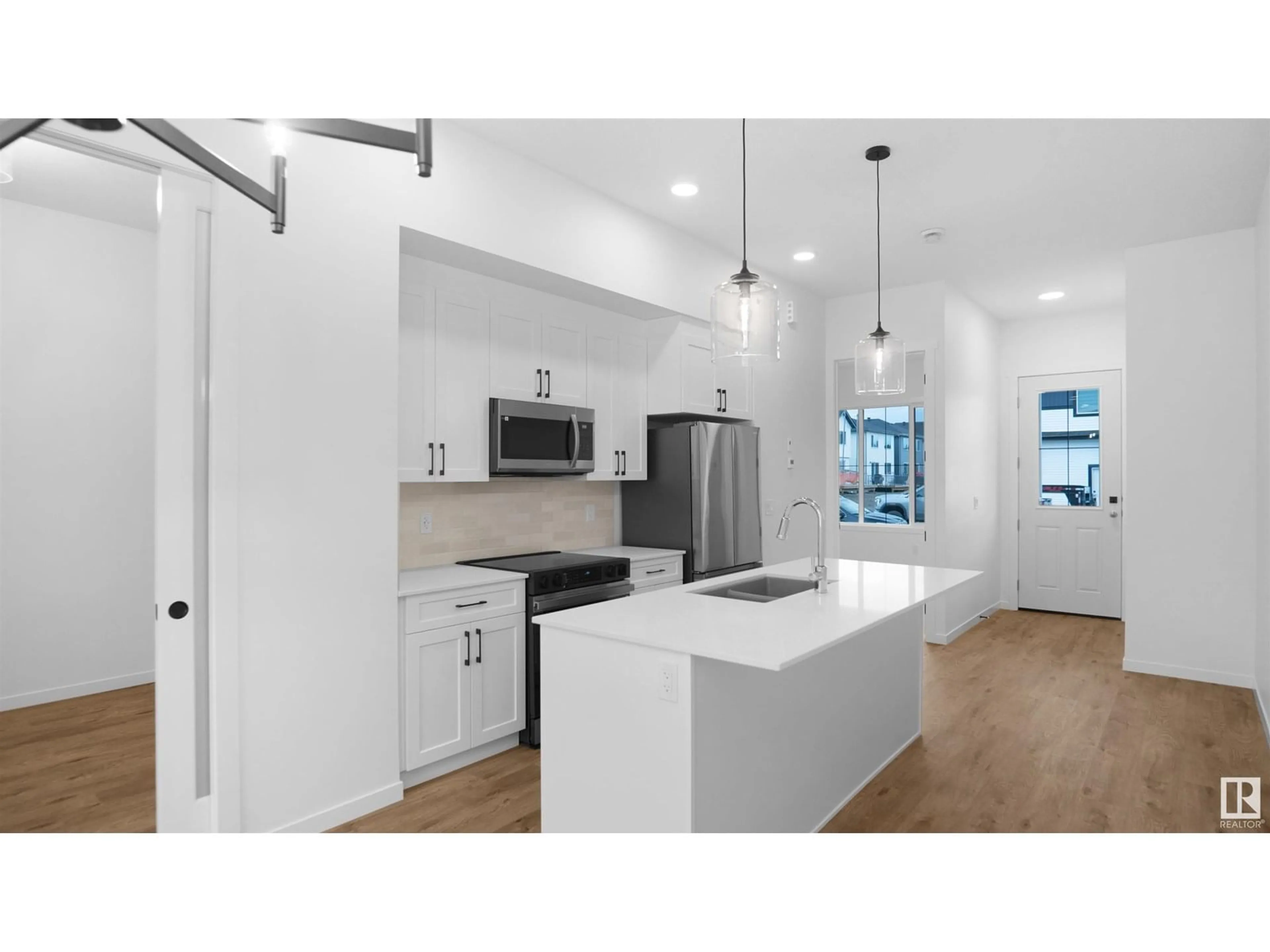 Open concept kitchen, unknown for NW - 20609 42 AV, Edmonton Alberta T6M0R8