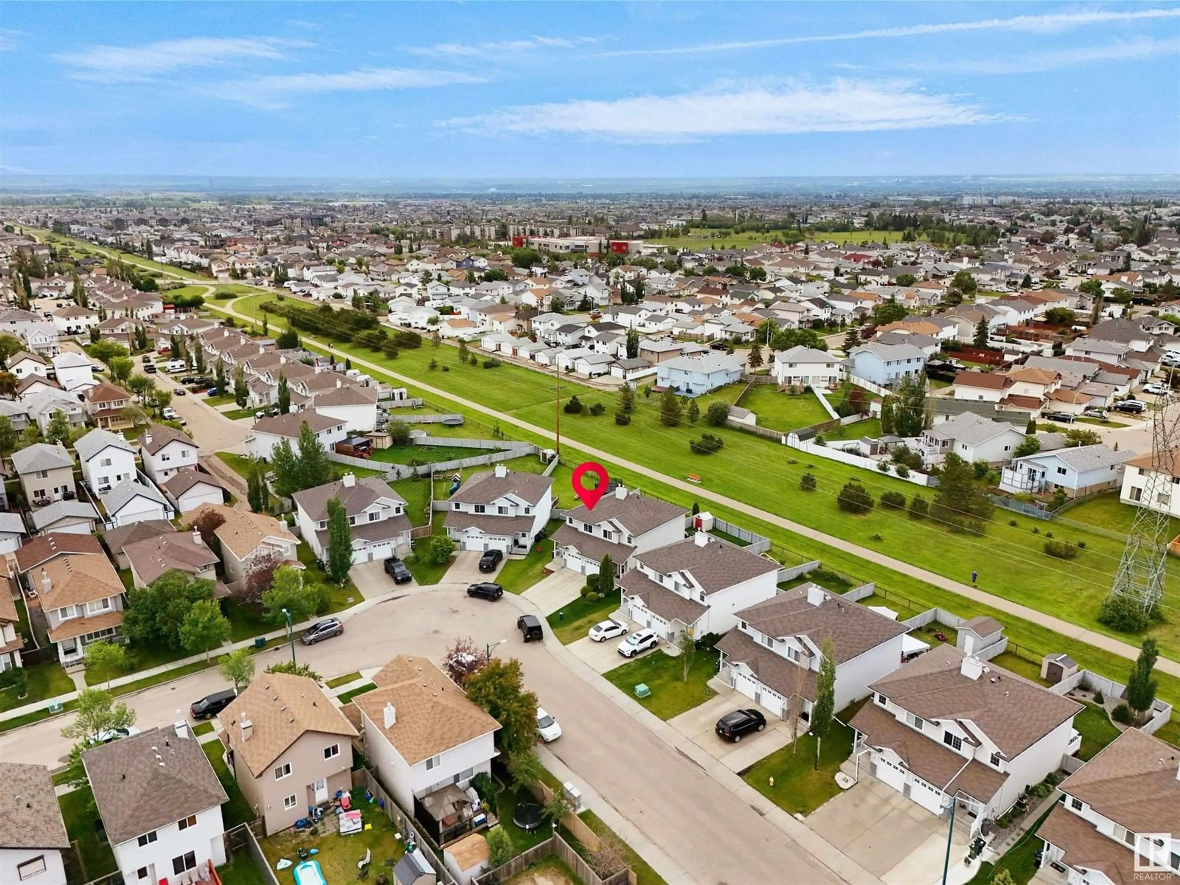 A pic from outside/outdoor area/front of a property/back of a property/a pic from drone, street for 5907 164 AV, Edmonton Alberta T5Y0B3