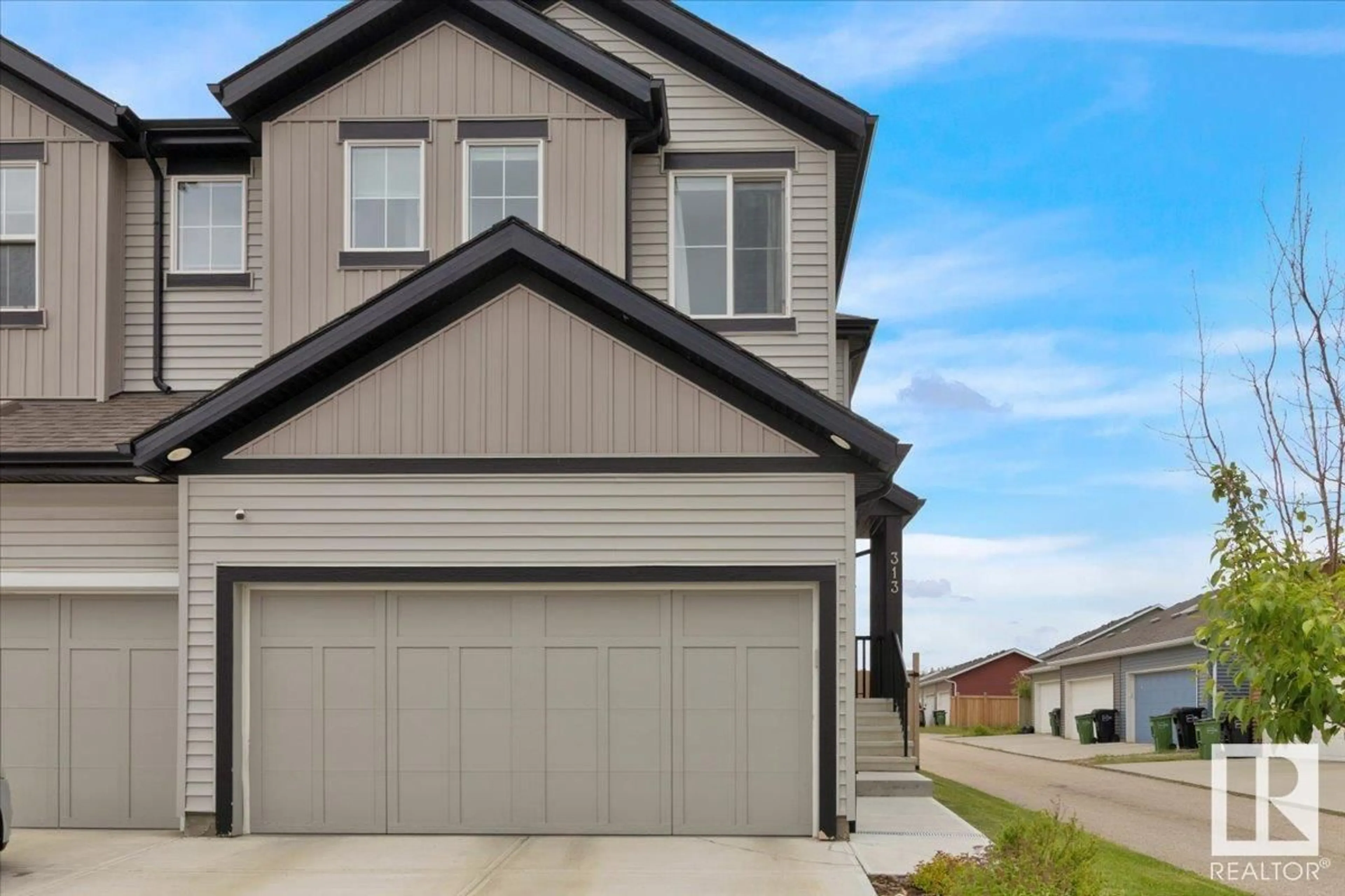 Home with vinyl exterior material, street for 313 40A AV, Edmonton Alberta T6T2E9