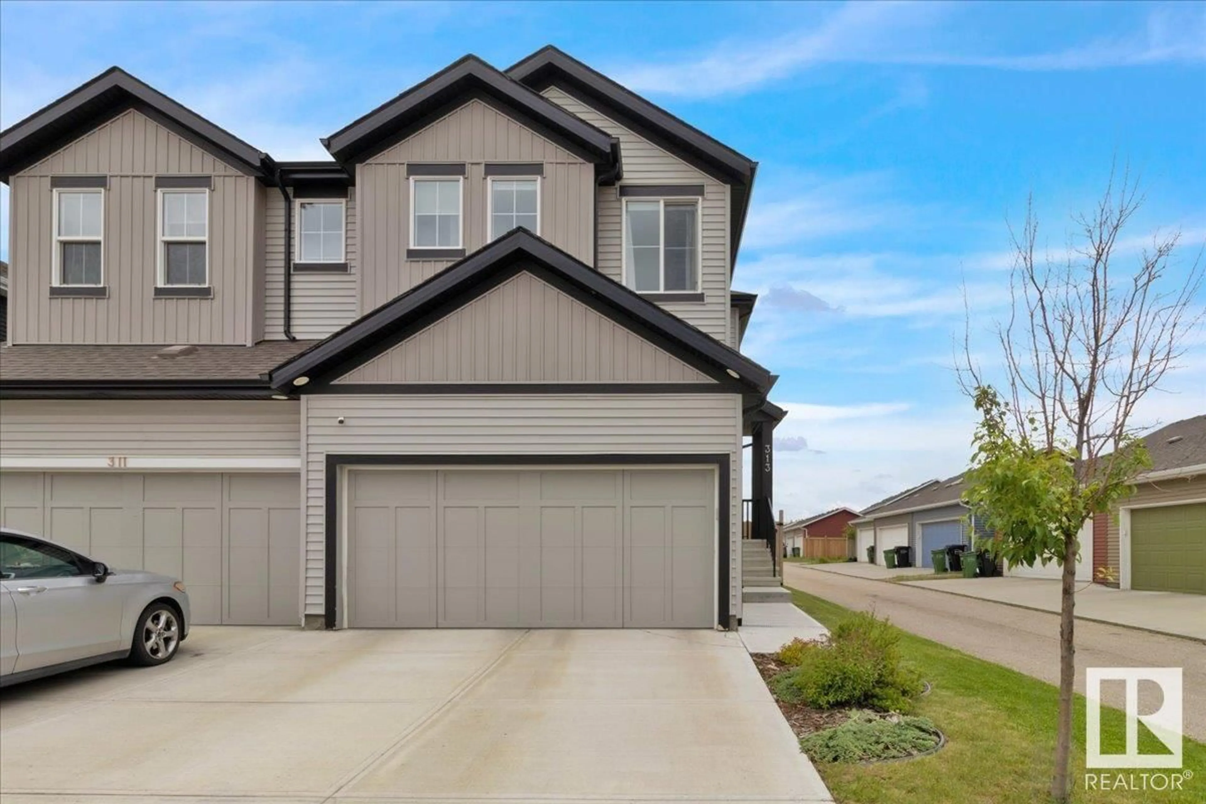 Home with vinyl exterior material, street for 313 40A AV, Edmonton Alberta T6T2E9