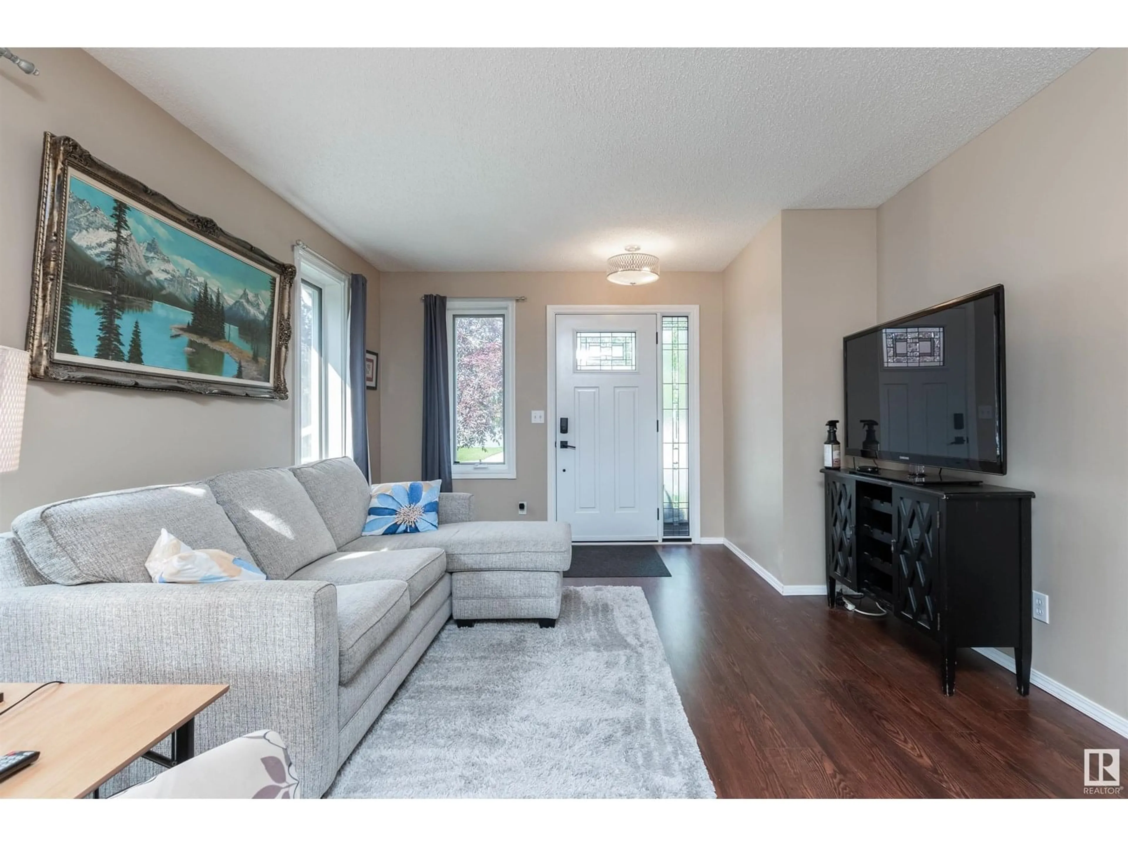Living room with furniture, wood/laminate floor for 319 DAVENPORT DR, Sherwood Park Alberta T8H1Y1