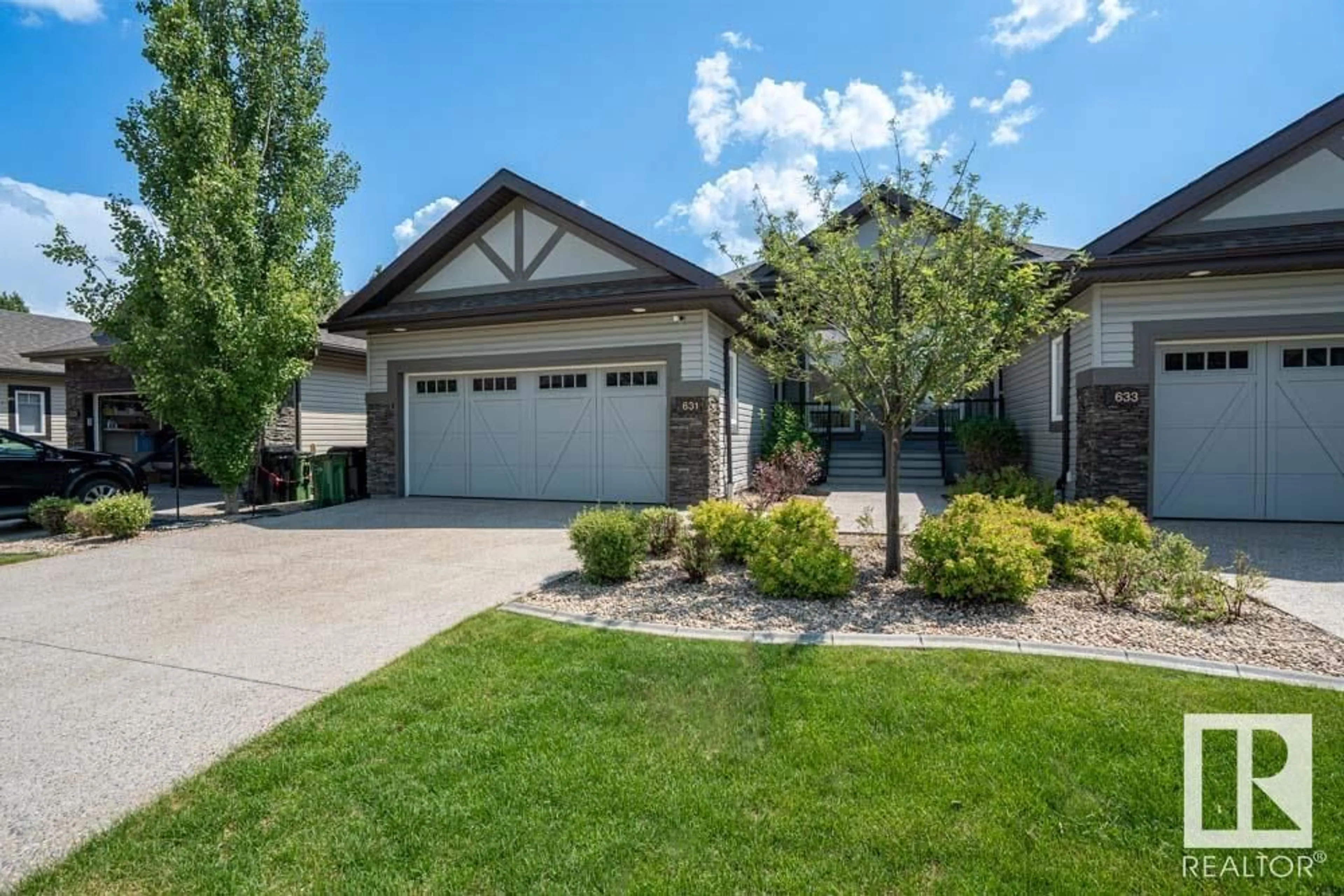 Home with brick exterior material, street for SW SW - 631 CANTOR LANDING LD, Edmonton Alberta T6W0V6