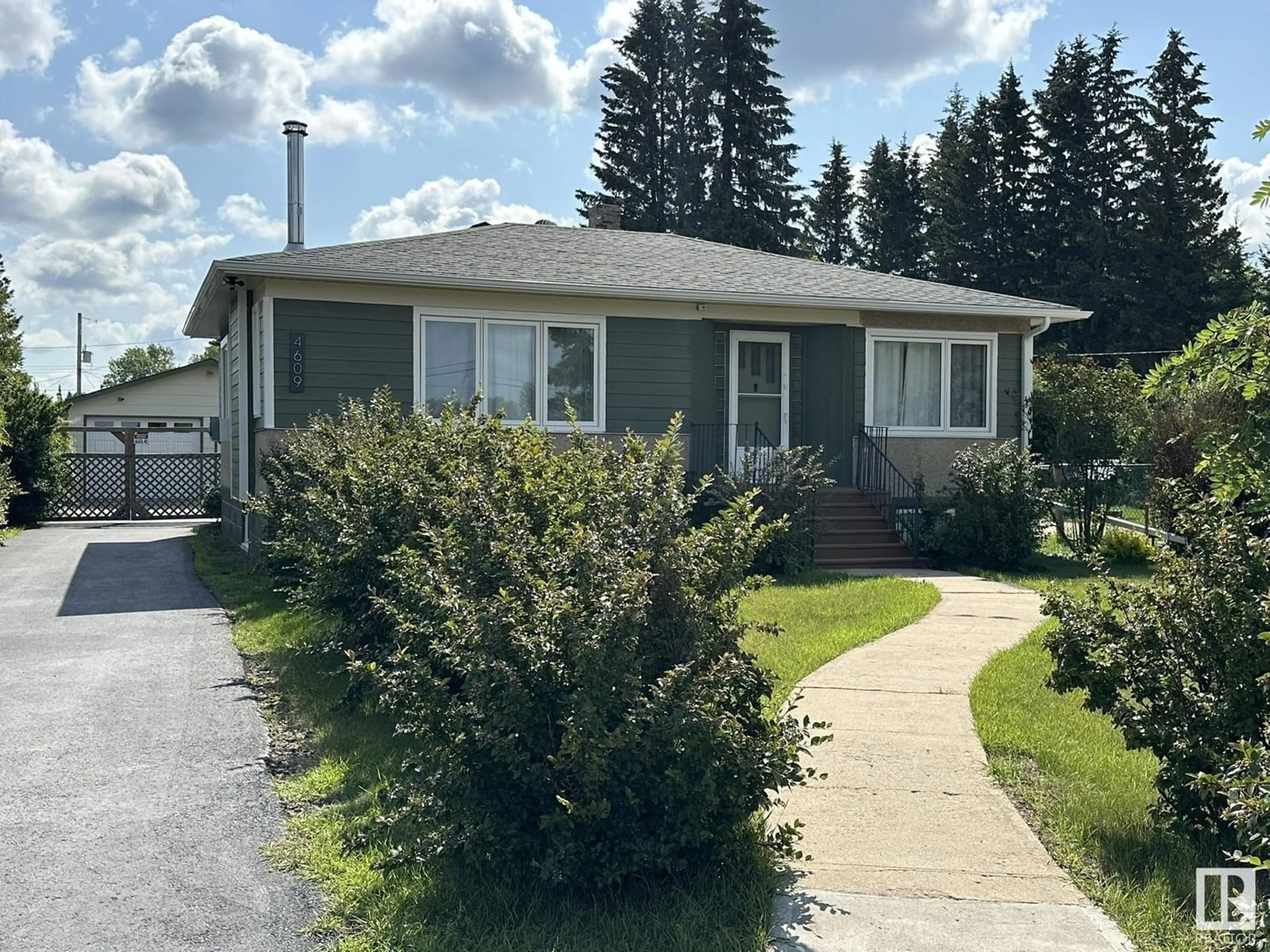 Home with vinyl exterior material, street for 4609 EAST RAILWAY DR, Smoky Lake Town Alberta T0A3C0