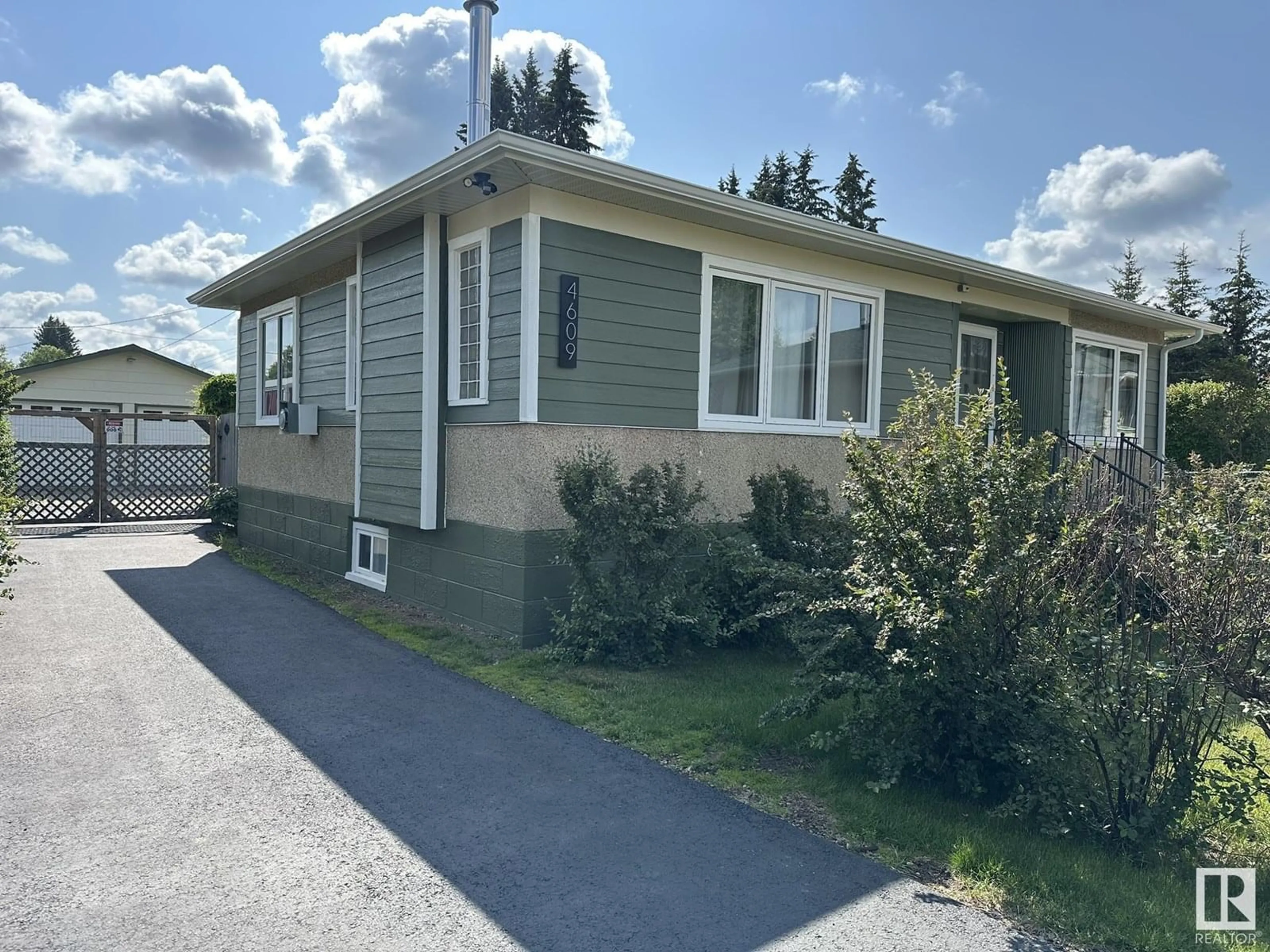 Home with vinyl exterior material, street for 4609 EAST RAILWAY DR, Smoky Lake Town Alberta T0A3C0