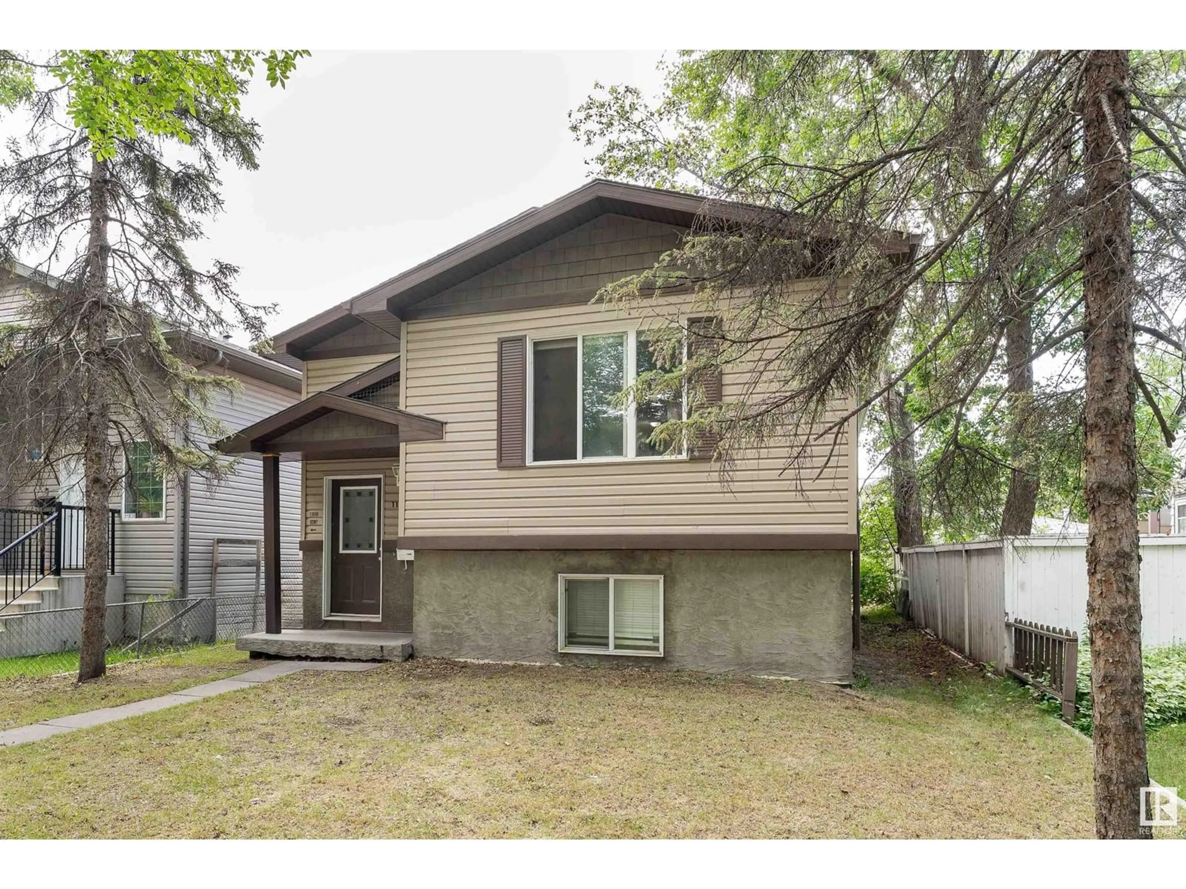 Home with vinyl exterior material, street for NW - 11840 96 ST, Edmonton Alberta T5G1V3