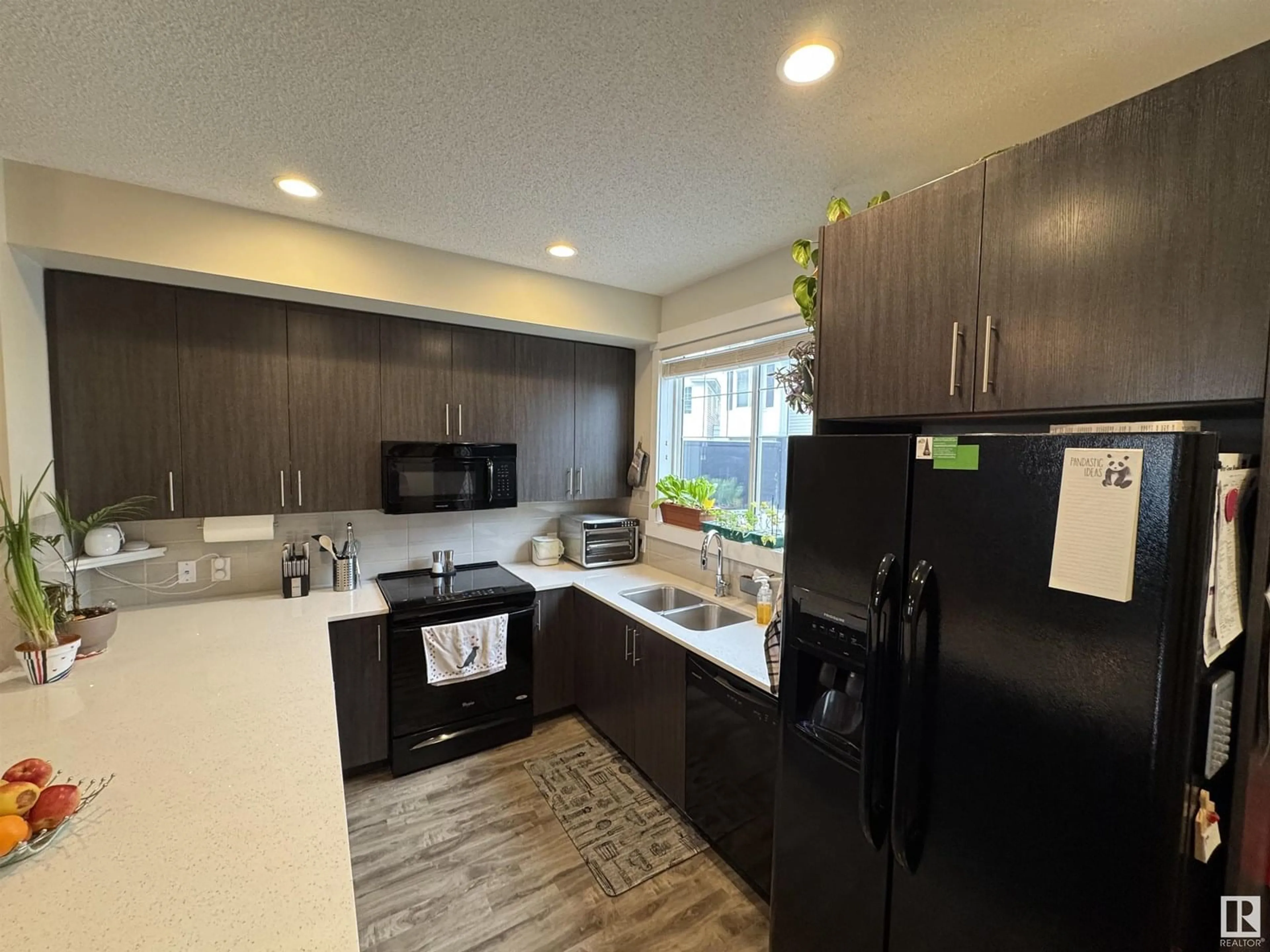 Open concept kitchen, unknown for 903 - 94 CRYSTALLINA NERA WY, Edmonton Alberta T5Z0N6