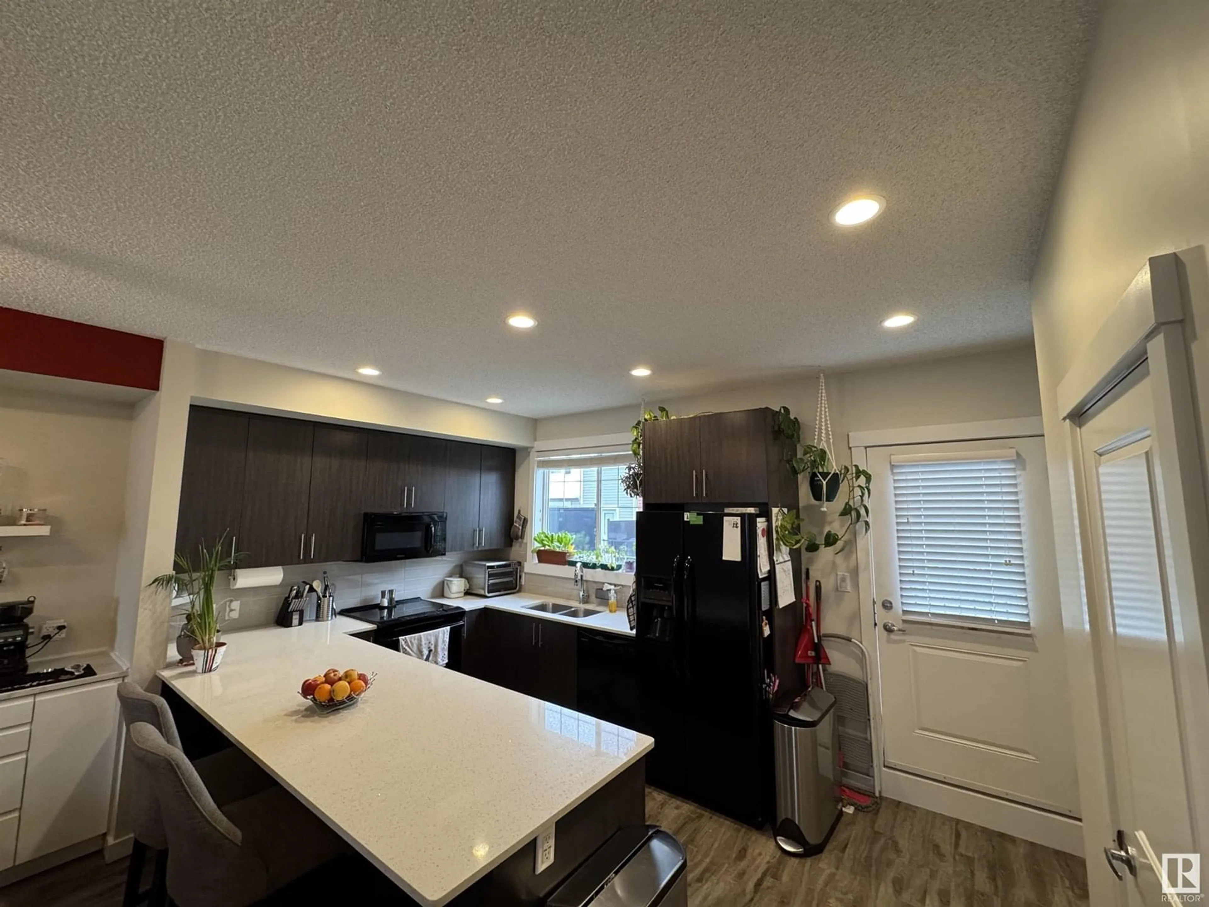 Open concept kitchen, unknown for 903 - 94 CRYSTALLINA NERA WY, Edmonton Alberta T5Z0N6