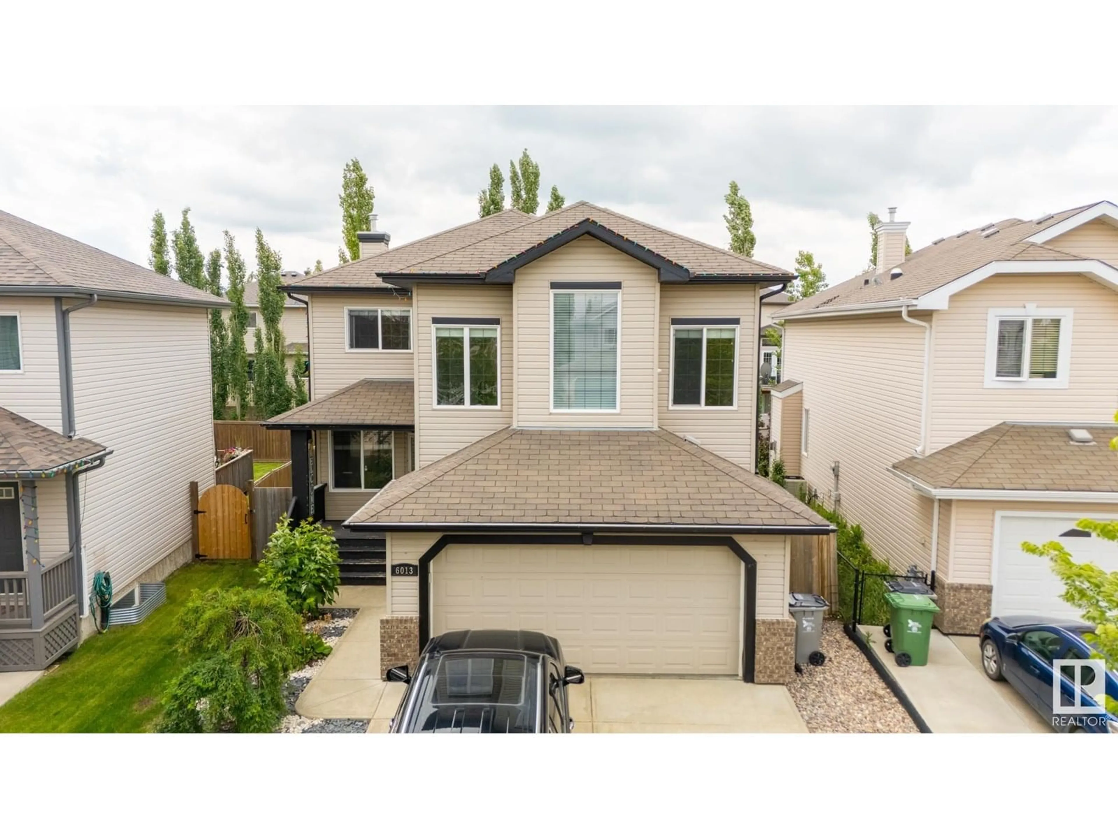 Home with vinyl exterior material, street for 6013 48 AVENUE, Beaumont Alberta T4X0A3