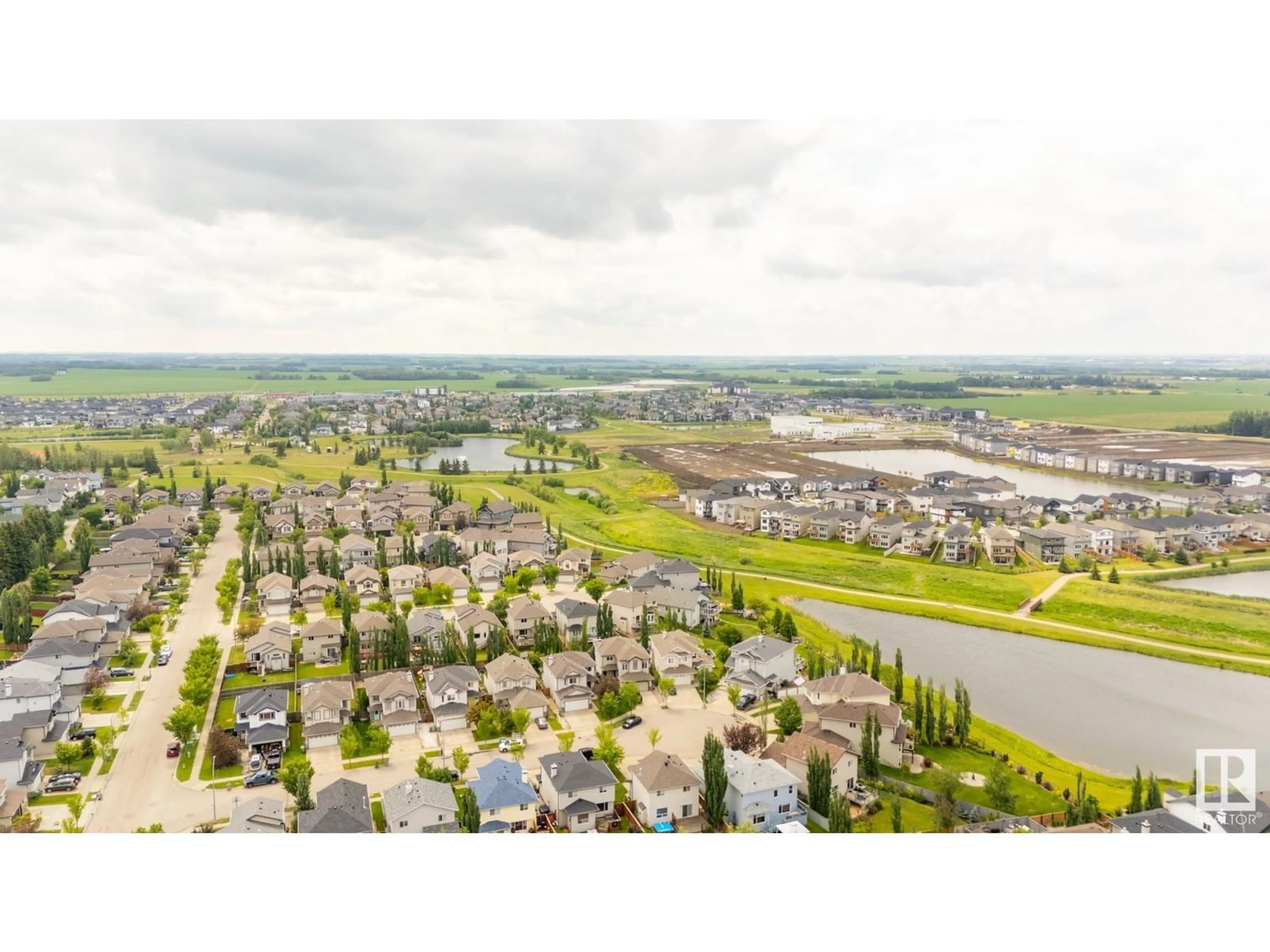 A pic from outside/outdoor area/front of a property/back of a property/a pic from drone, mountain view for 6013 48 AVENUE, Beaumont Alberta T4X0A3