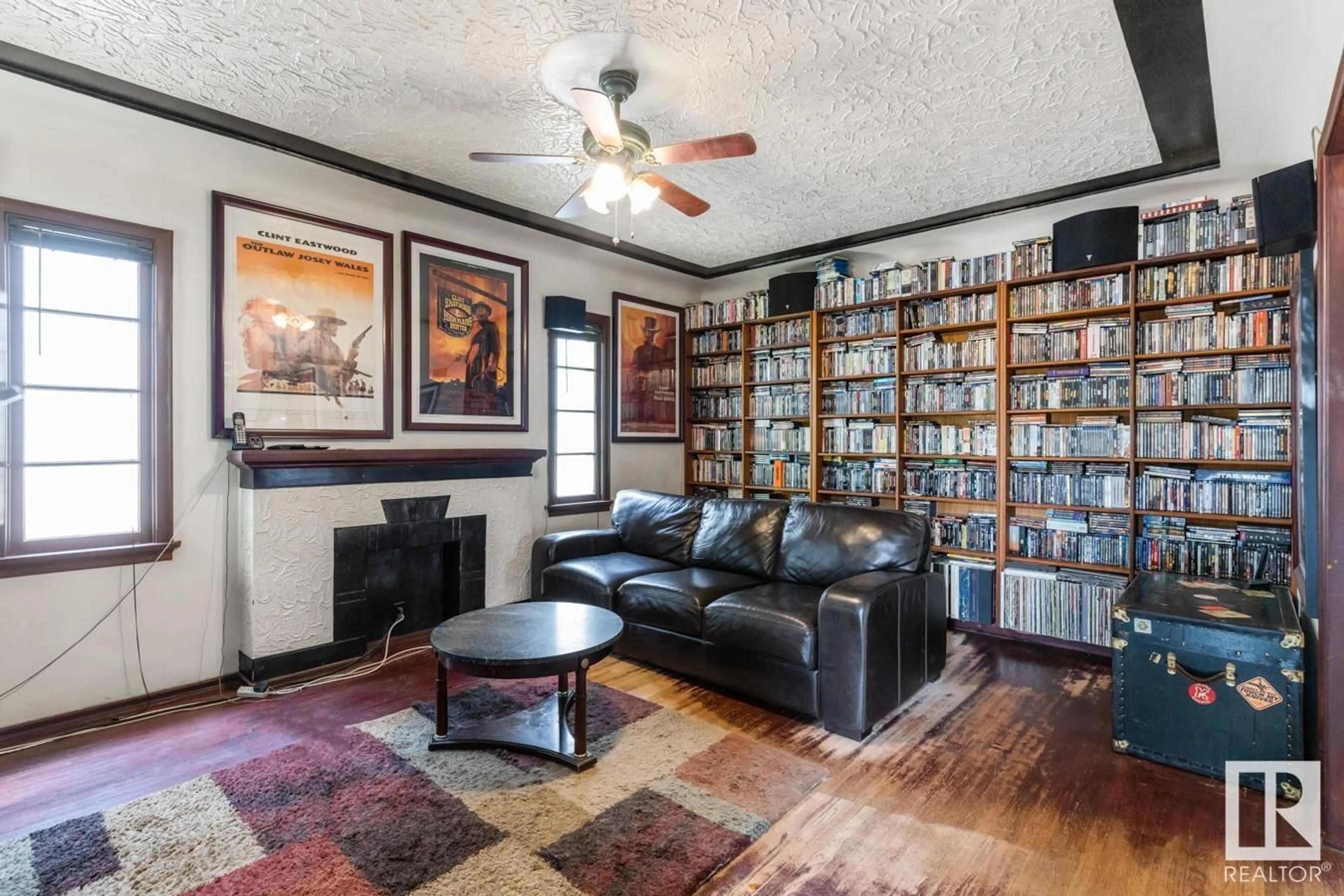 Living room with furniture, unknown for 9732 80 AV, Edmonton Alberta T6E1S7