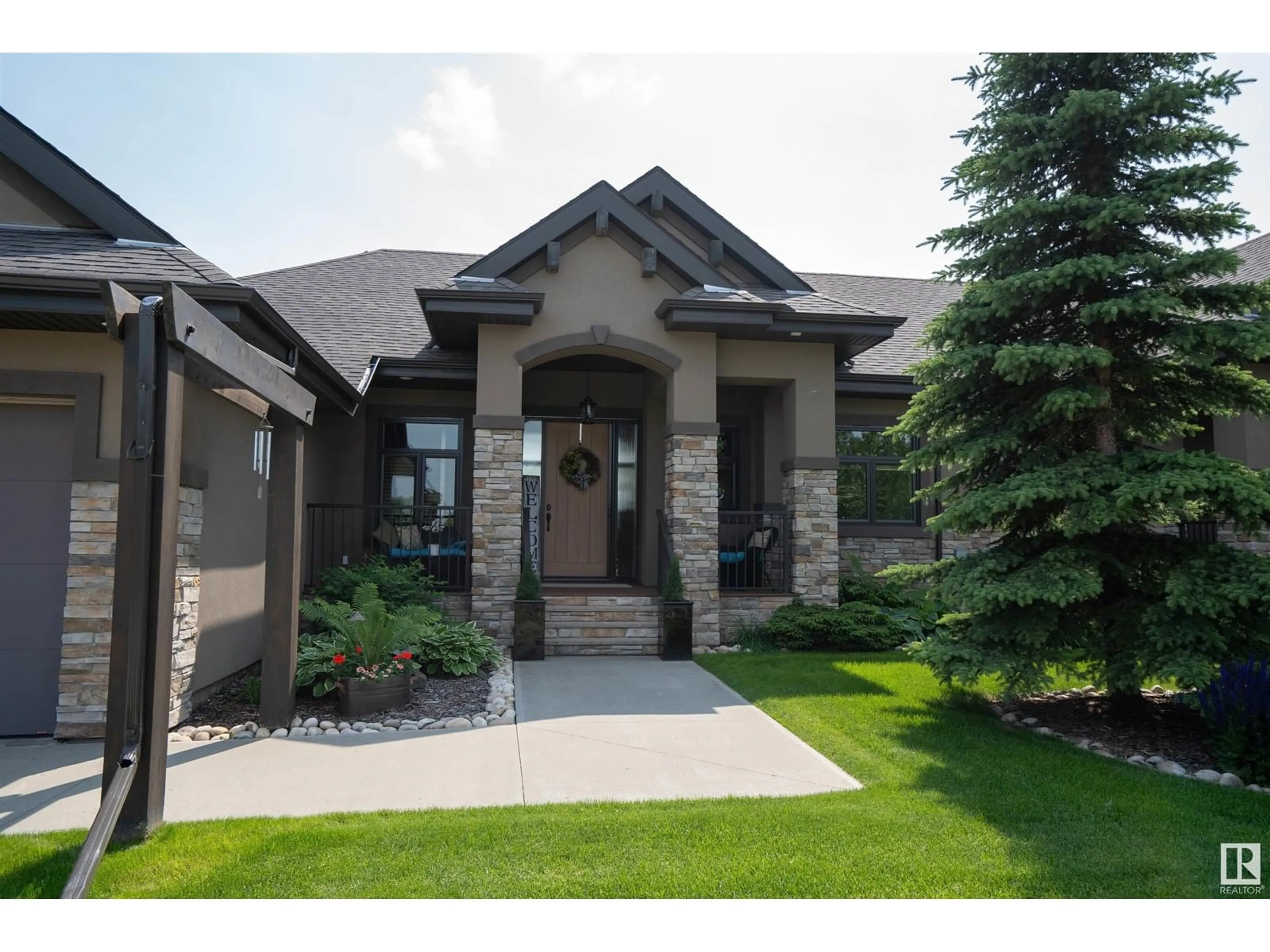 Home with brick exterior material, street for 53521 - 17B RGE ROAD 272, Rural Parkland County Alberta T7X3M5