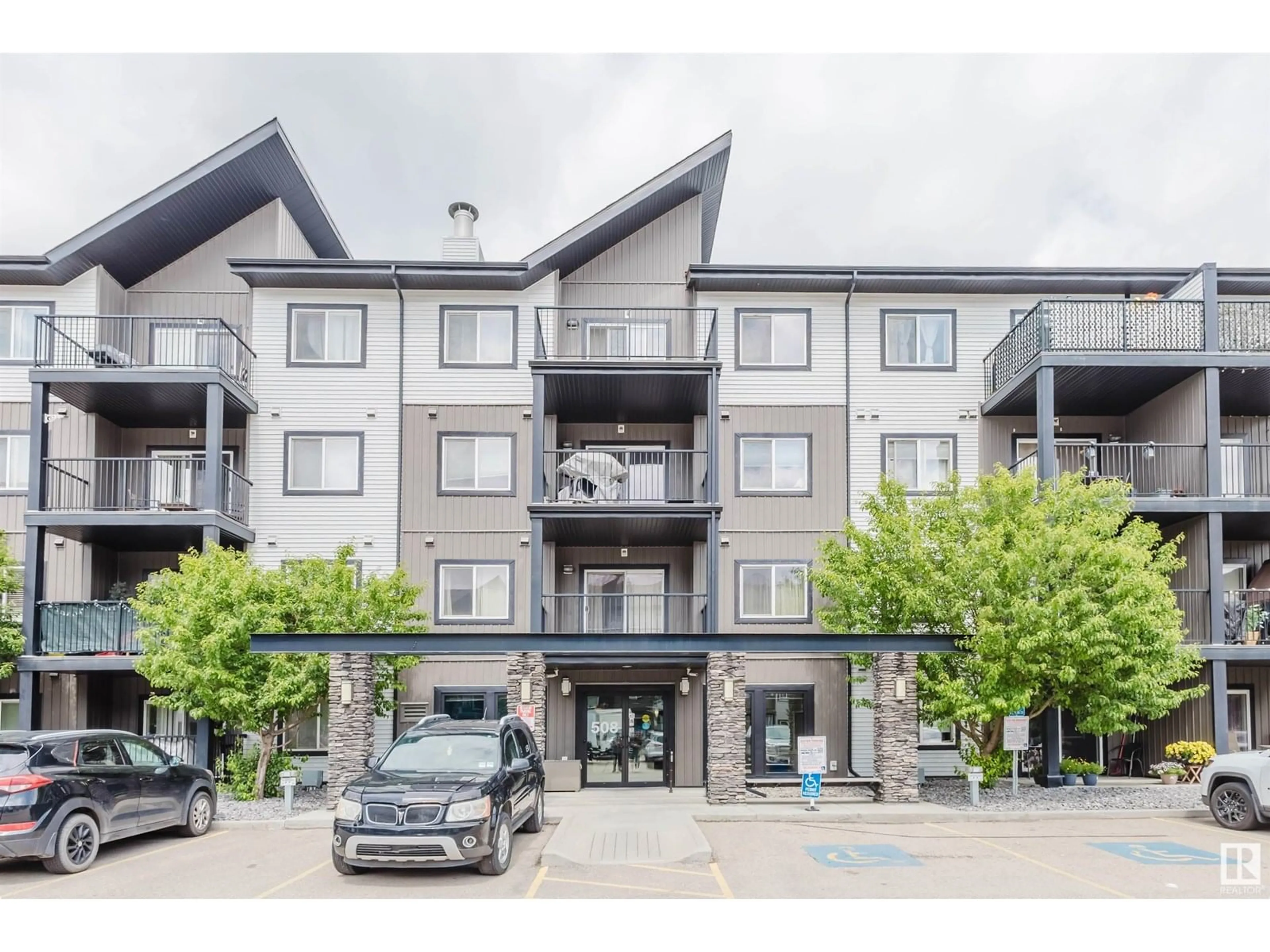 A pic from outside/outdoor area/front of a property/back of a property/a pic from drone, unknown for #107 - 508 ALBANY WY, Edmonton Alberta T6V1S8