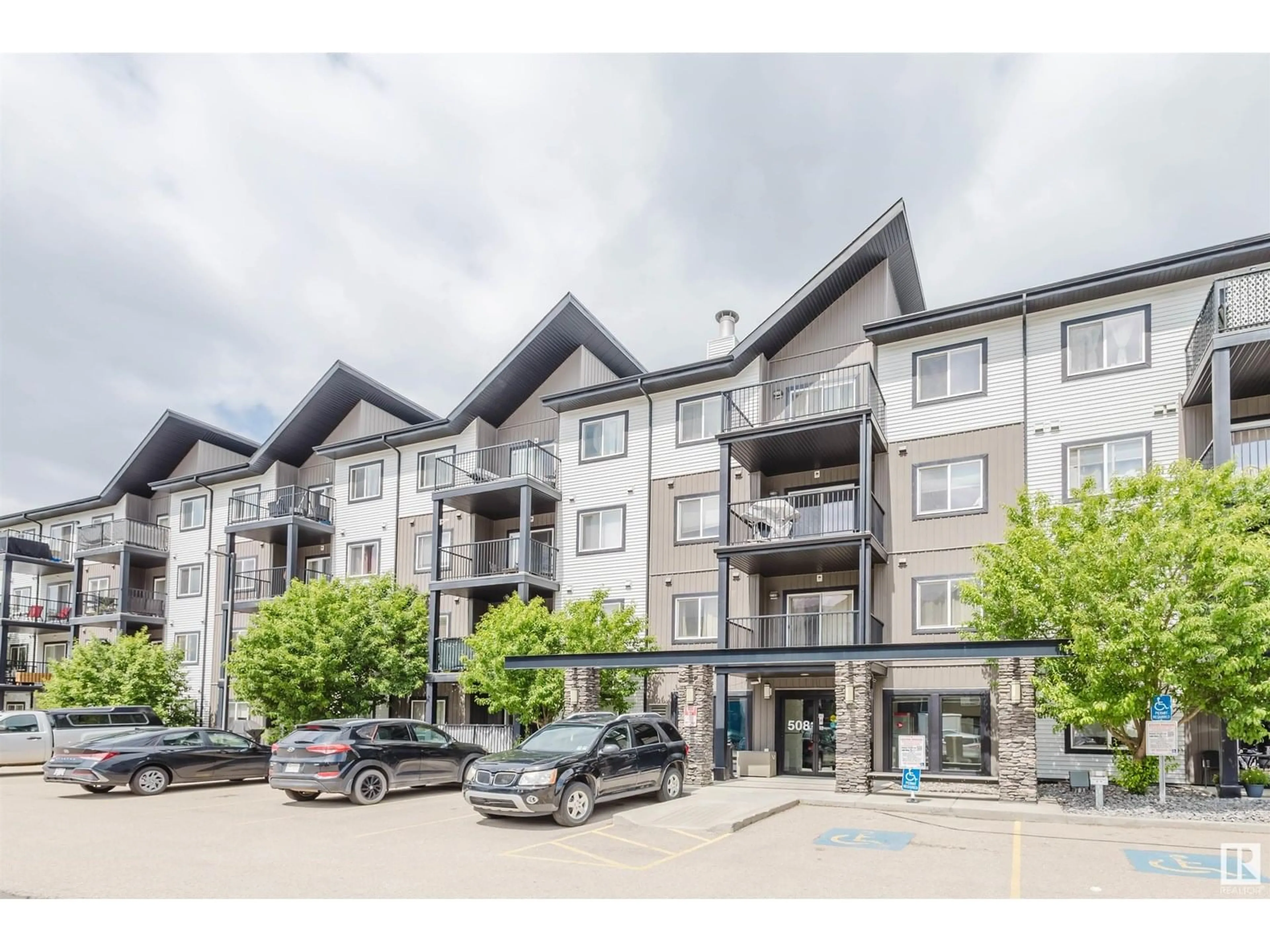 A pic from outside/outdoor area/front of a property/back of a property/a pic from drone, mountain view for #107 - 508 ALBANY WY, Edmonton Alberta T6V1S8