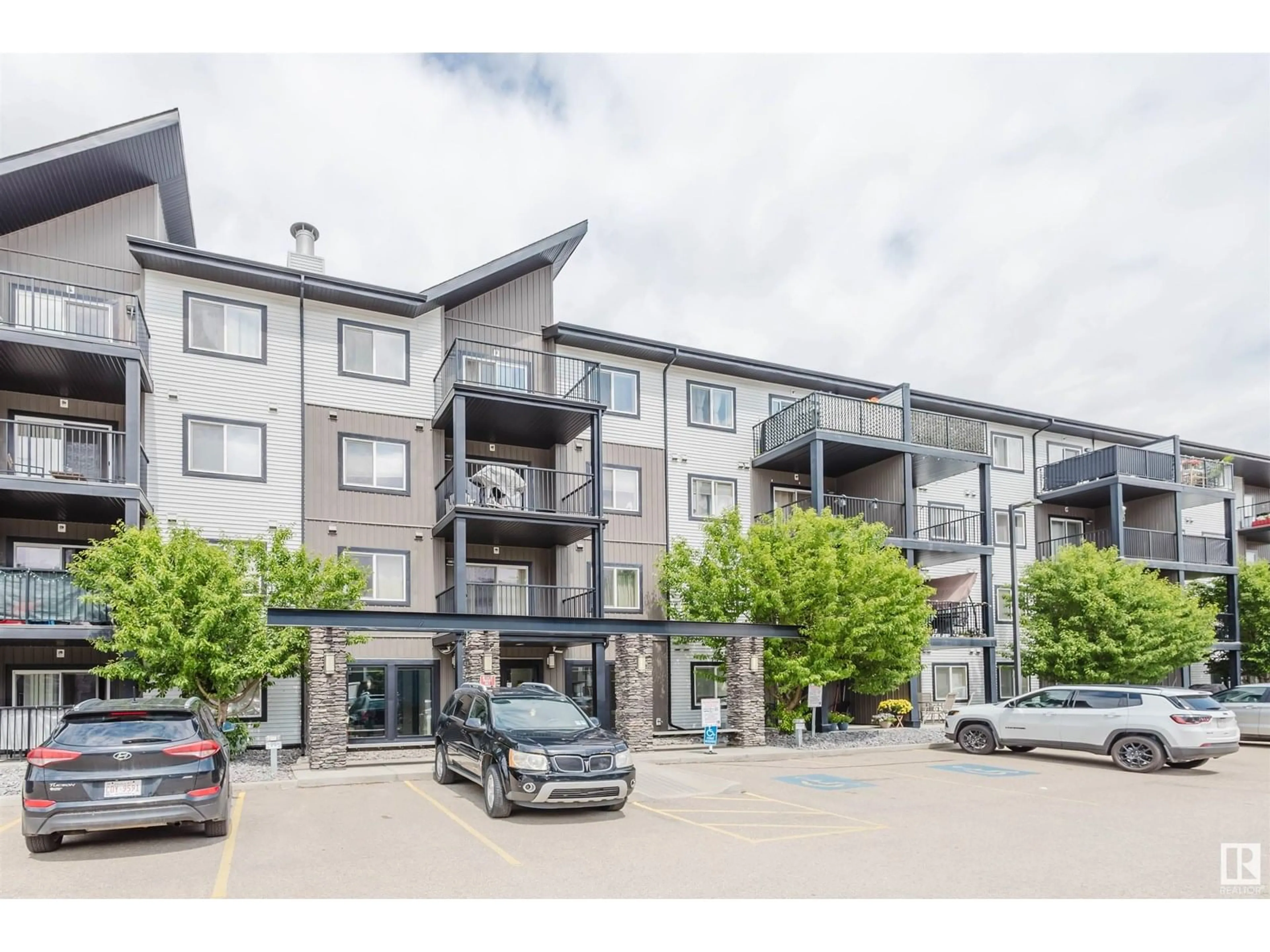 A pic from outside/outdoor area/front of a property/back of a property/a pic from drone, unknown for #107 - 508 ALBANY WY, Edmonton Alberta T6V1S8