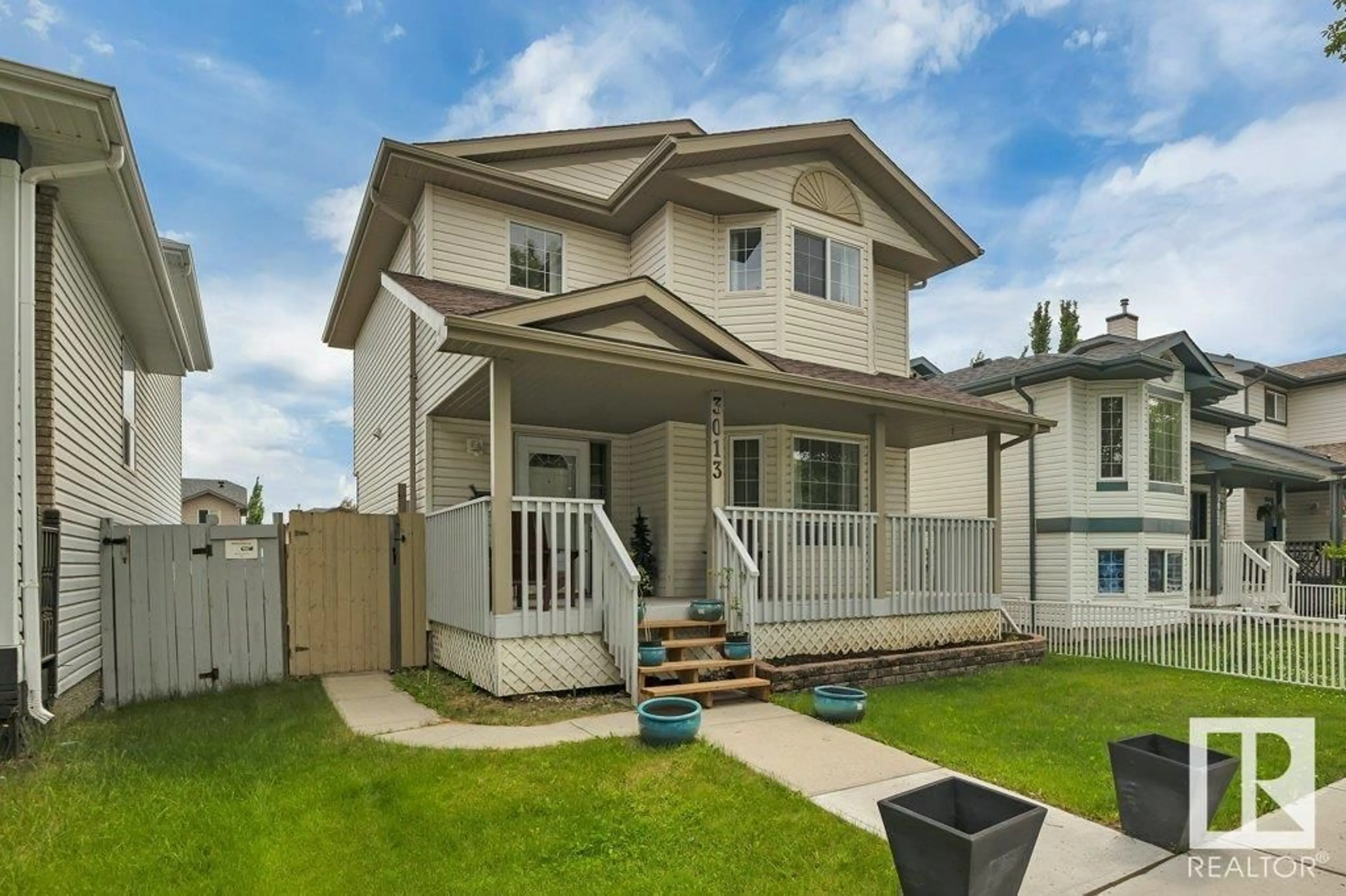Home with vinyl exterior material, street for 3013 - 3013 49 ST, Beaumont Alberta T4X1S6