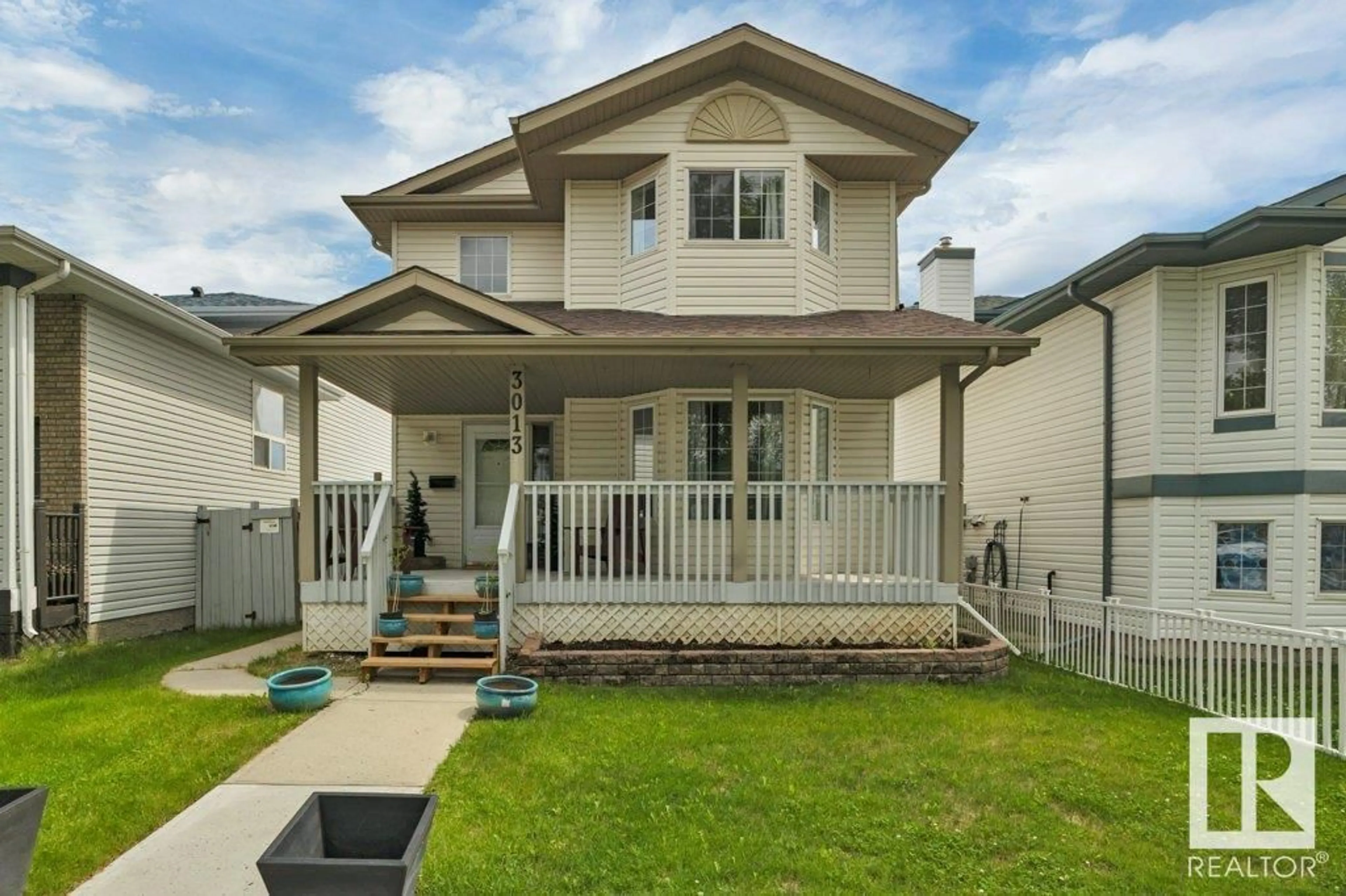 Home with vinyl exterior material, street for 3013 - 3013 49 ST, Beaumont Alberta T4X1S6