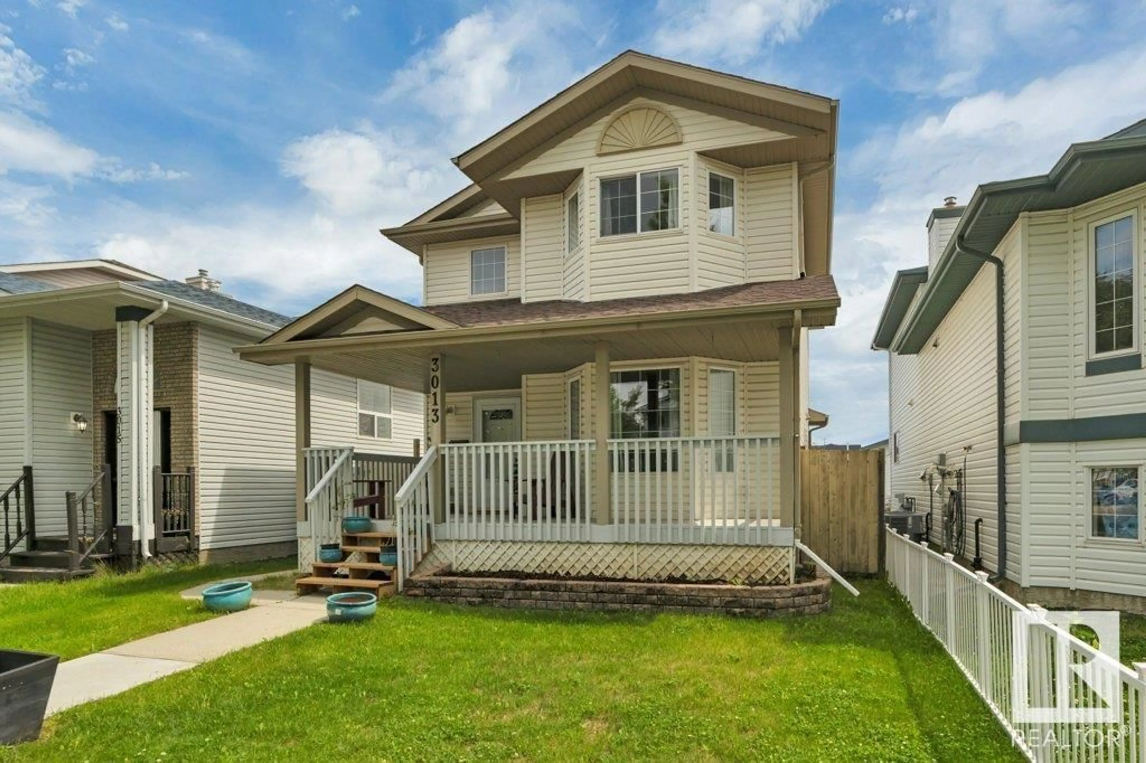 Home with vinyl exterior material, street for 3013 - 3013 49 ST, Beaumont Alberta T4X1S6