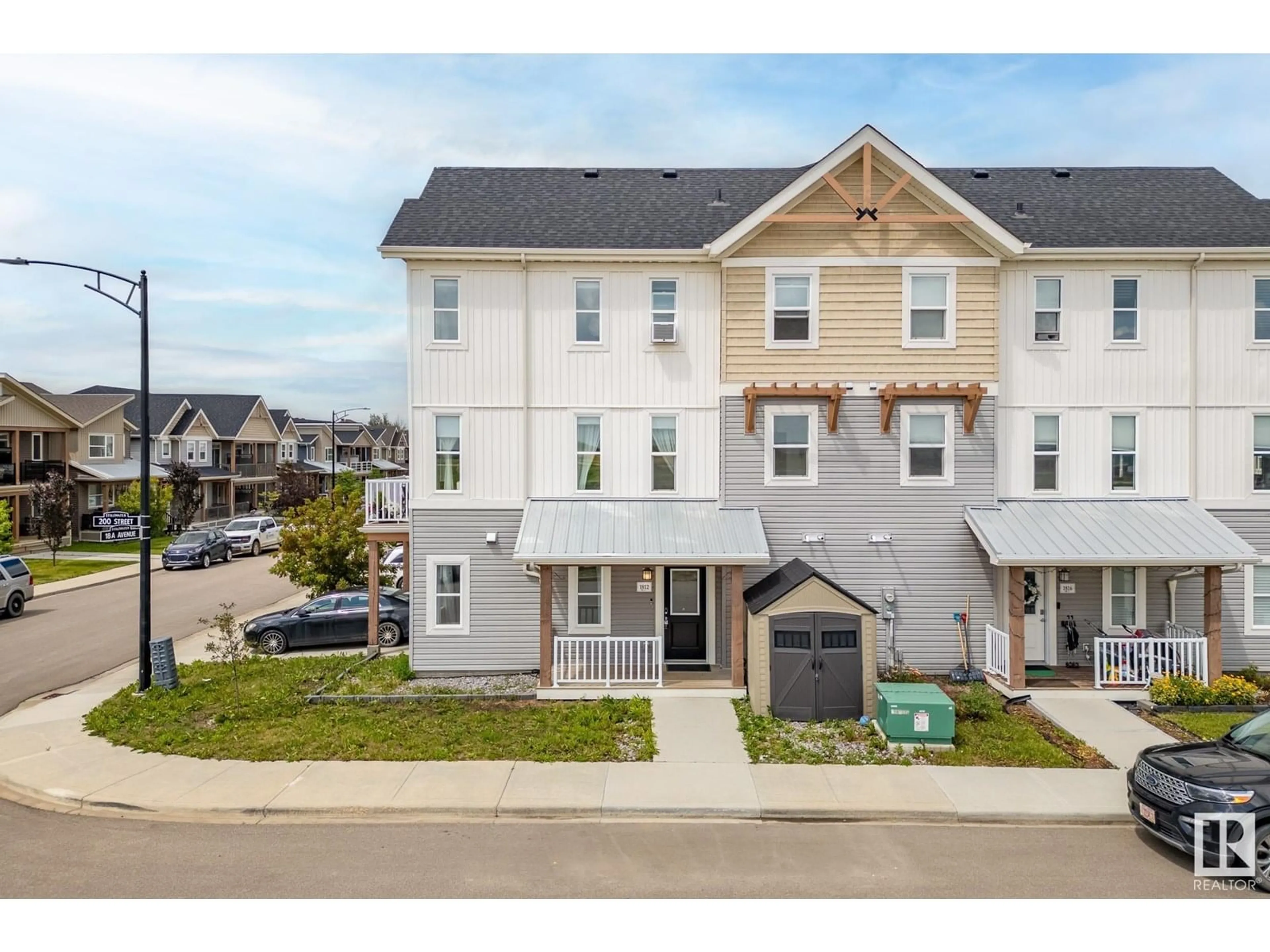A pic from outside/outdoor area/front of a property/back of a property/a pic from drone, street for 1812 200 ST, Edmonton Alberta T6M0X8