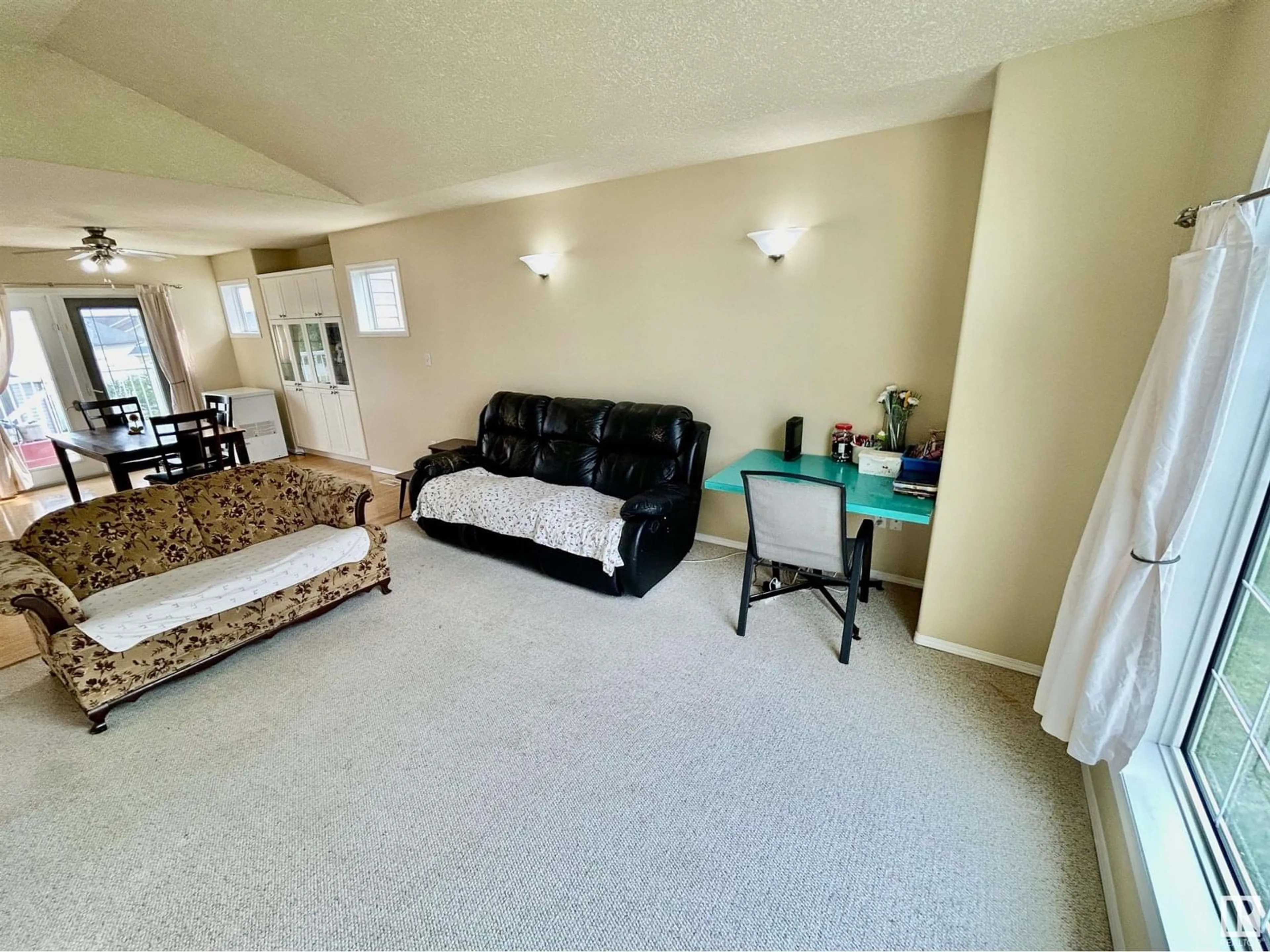 Living room with furniture, carpet floor for 5834 46 AV, St. Paul Town Alberta T0A3A1