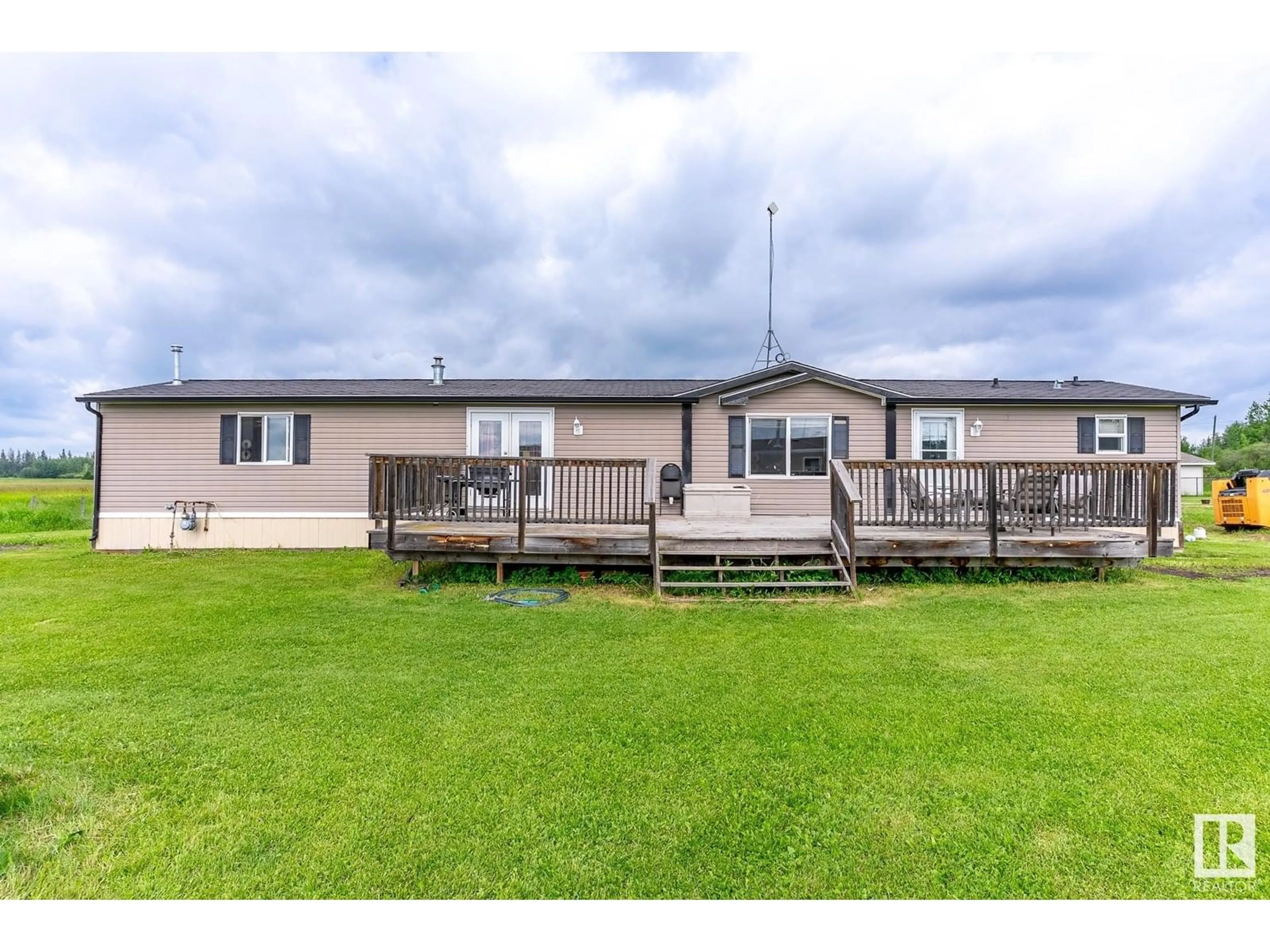 A pic from outside/outdoor area/front of a property/back of a property/a pic from drone, water/lake/river/ocean view for 149 3510 STE. ANNE TR, Rural Lac Ste. Anne County Alberta T0E0A0