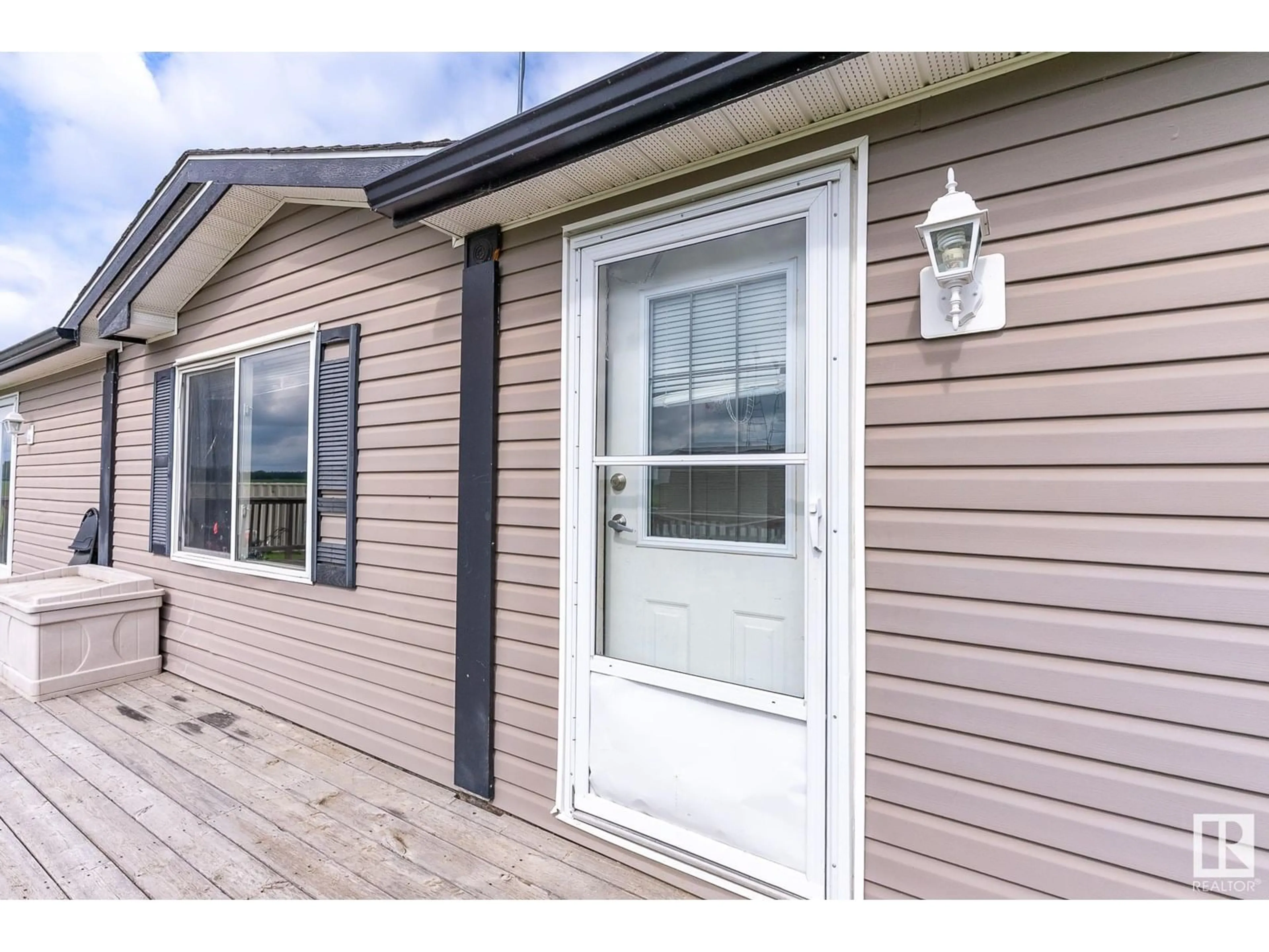 Home with vinyl exterior material, street for 149 3510 STE. ANNE TR, Rural Lac Ste. Anne County Alberta T0E0A0