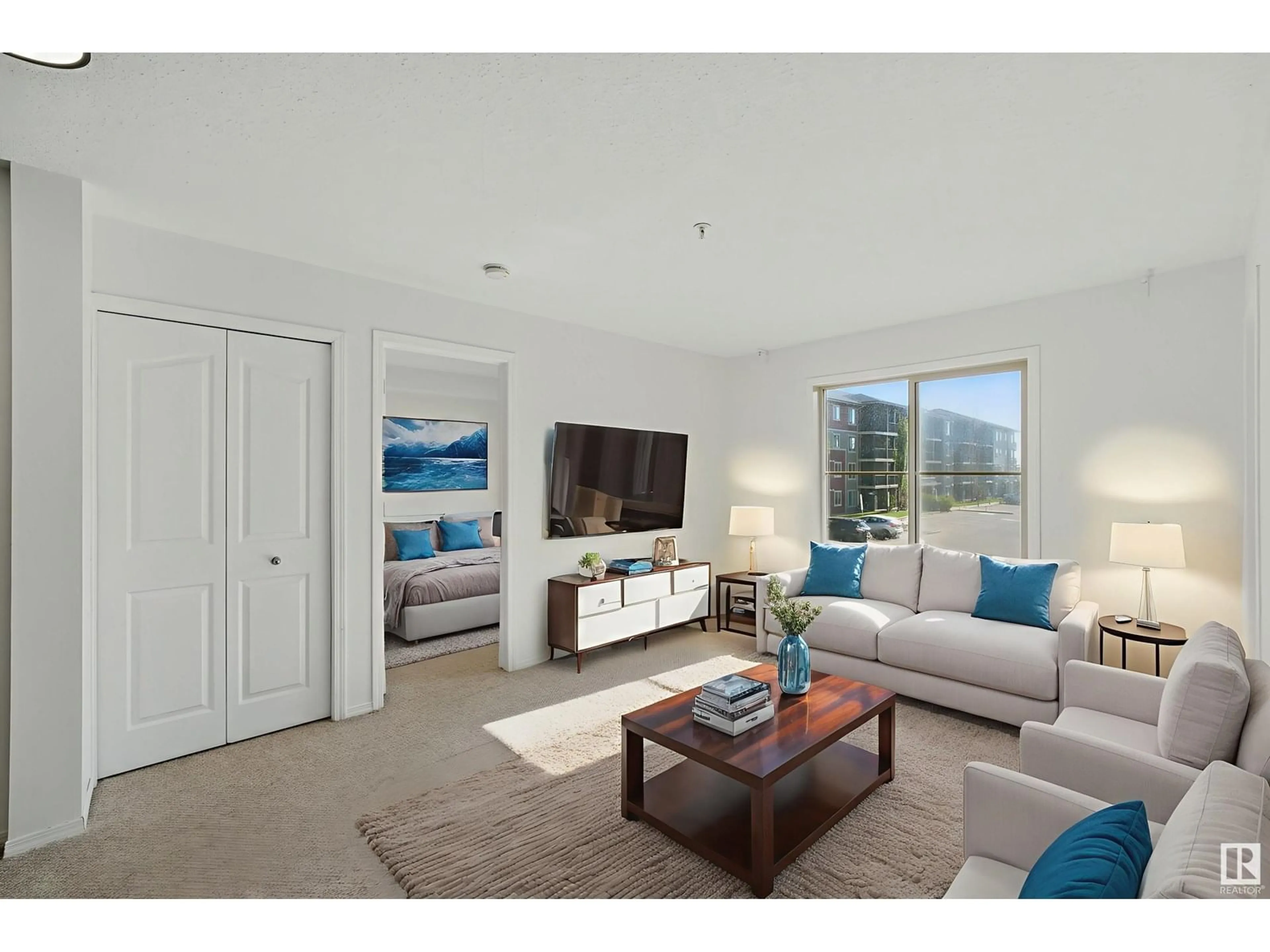 Living room with furniture, unknown for #213 - 1060 MCCONACHIE BV, Edmonton Alberta T5Y0W9