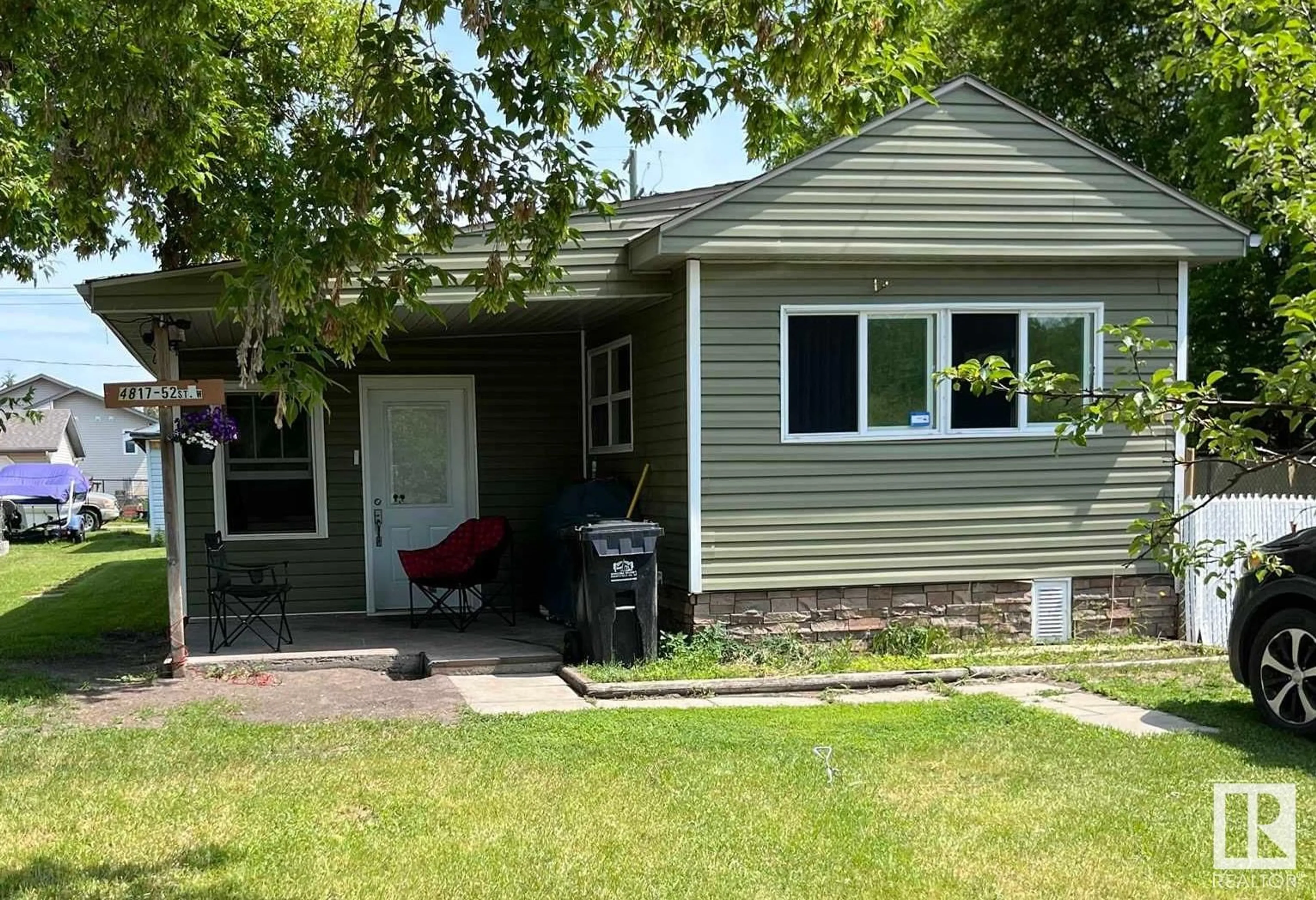 Home with vinyl exterior material, street for 4817 52 ST, Ardmore Alberta T0A0B0
