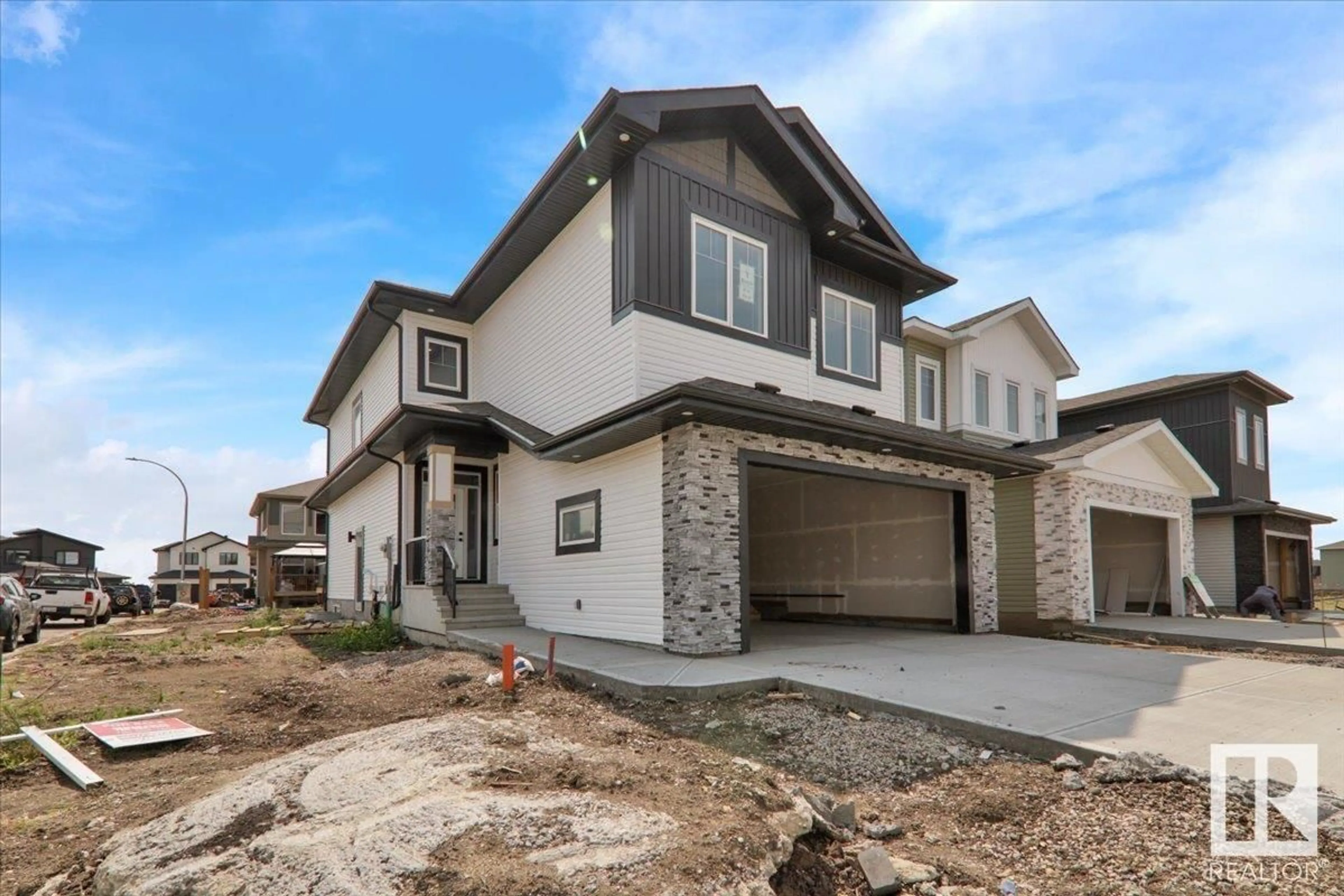 Home with brick exterior material, street for 1 BLACKBIRD BEND, Fort Saskatchewan Alberta T8L0G6