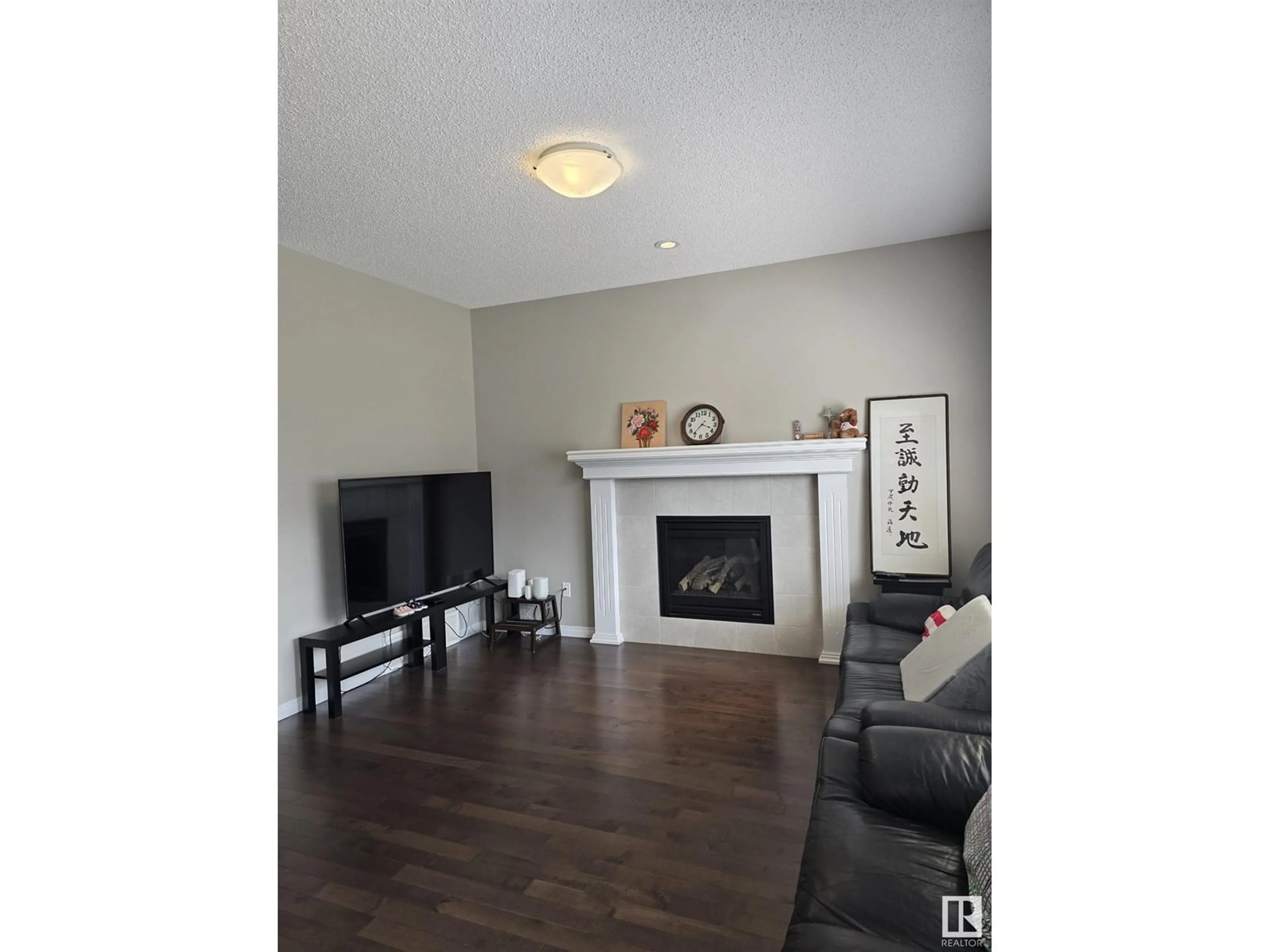 Living room with furniture, wood/laminate floor for 3437 ABBOTT WAY, Edmonton Alberta T6W2M3