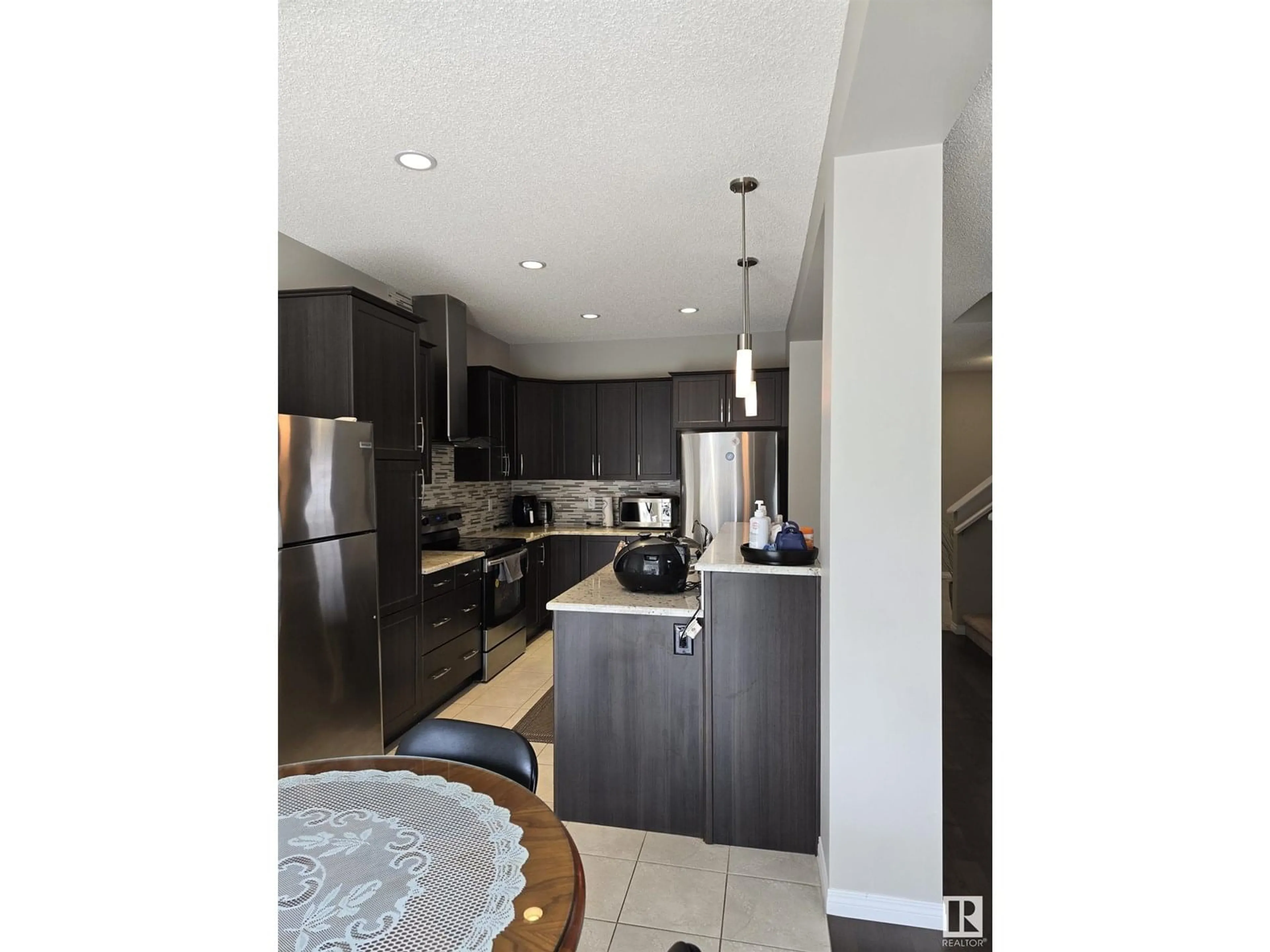 Contemporary kitchen, ceramic/tile floor for 3437 ABBOTT WAY, Edmonton Alberta T6W2M3