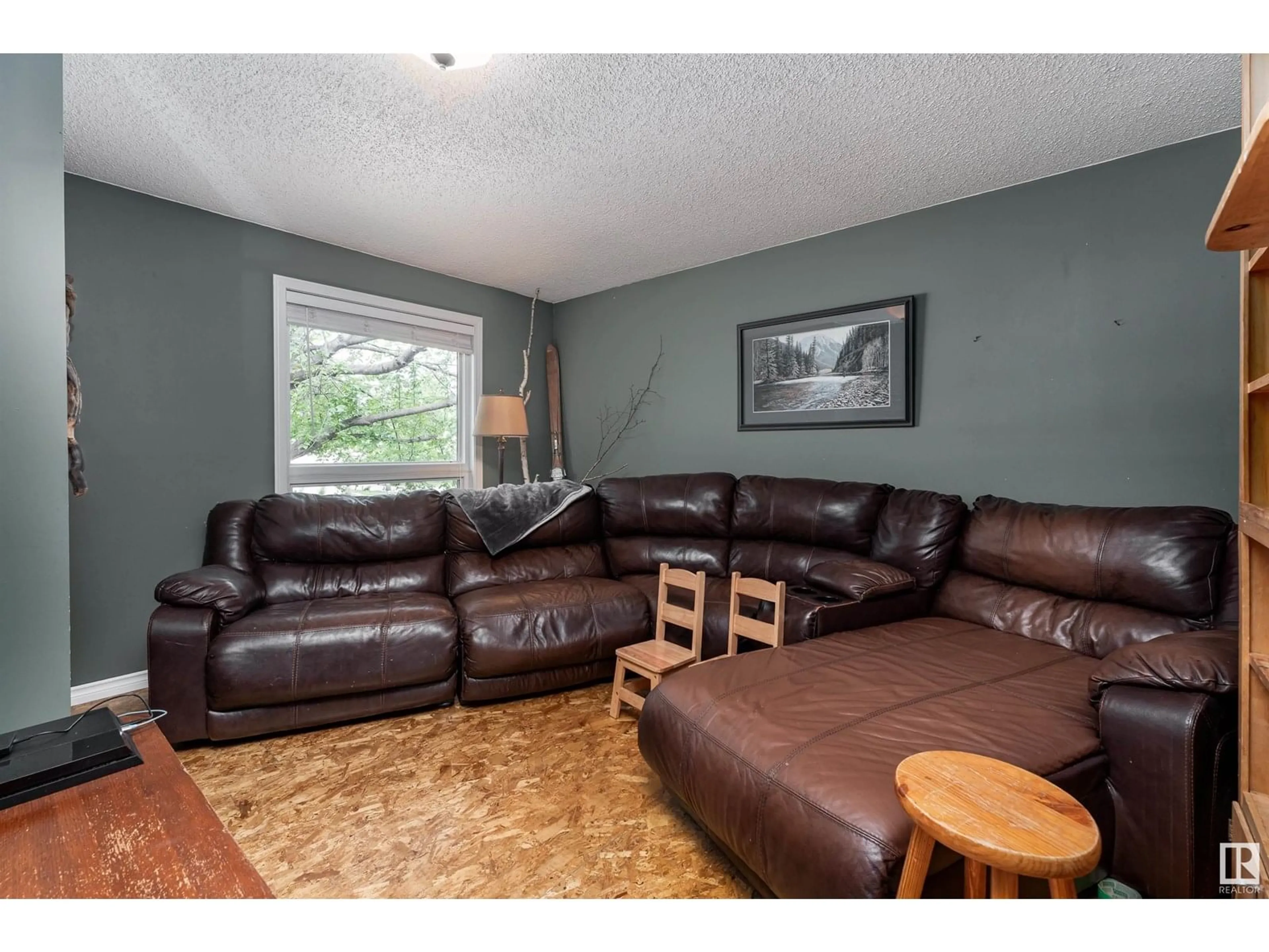 Living room with furniture, wood/laminate floor for 95 GREYSTONE DR, Spruce Grove Alberta T7X1Y7
