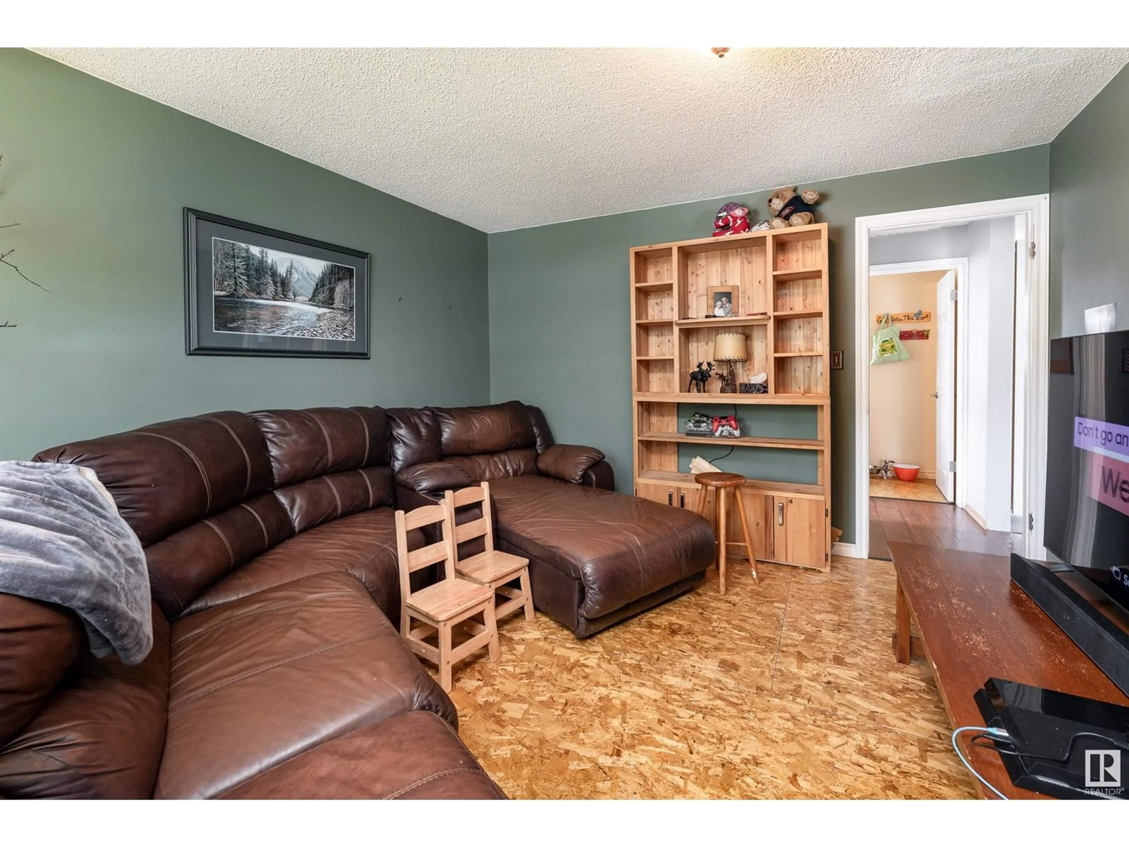 Living room with furniture, wood/laminate floor for 95 GREYSTONE DR, Spruce Grove Alberta T7X1Y7