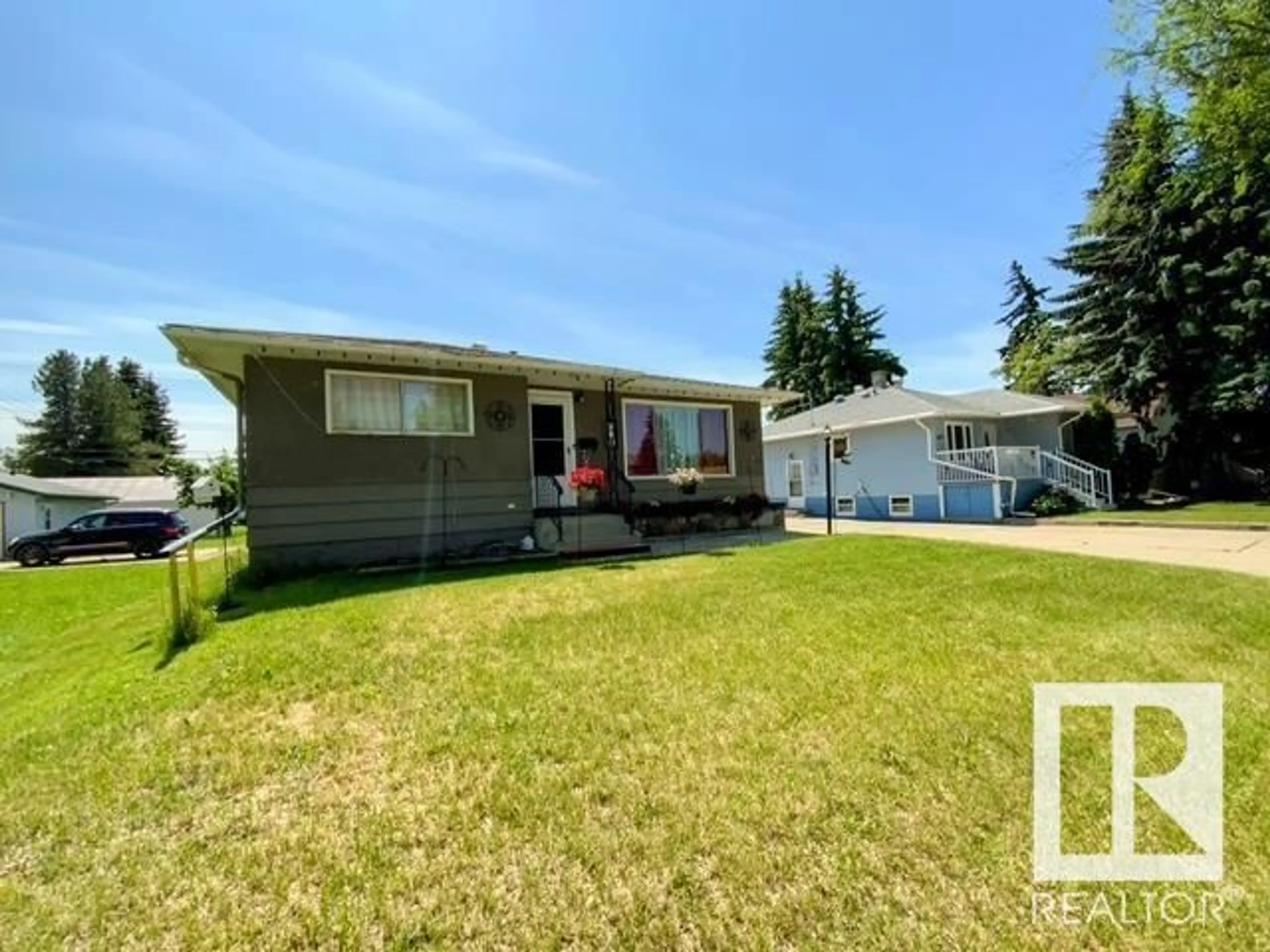 Home with vinyl exterior material, street for 4803 52 AV, Wetaskiwin Alberta T9A0W7
