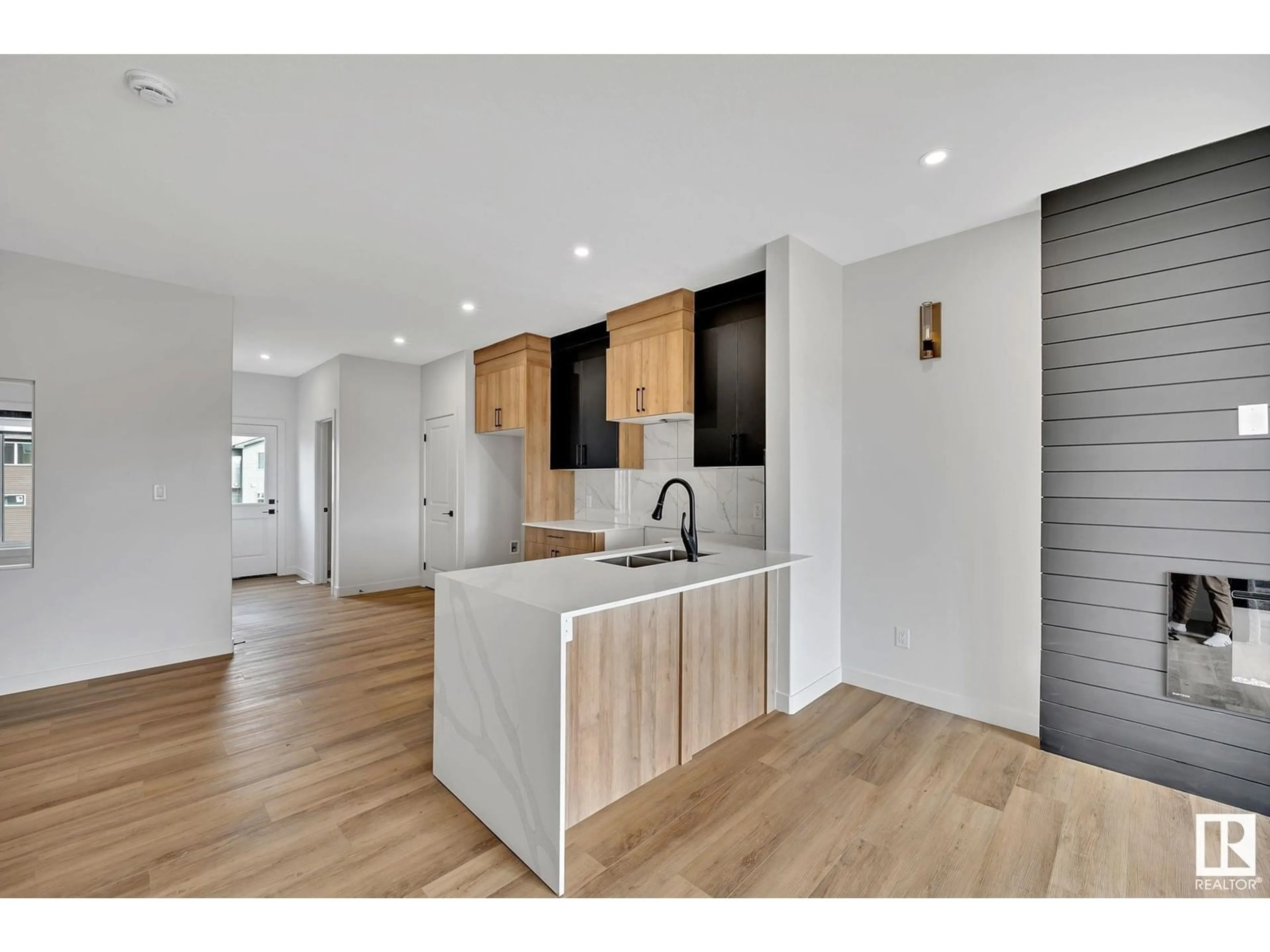 Open concept kitchen, wood/laminate floor for NW - 252 24 ST, Edmonton Alberta T6X3J1