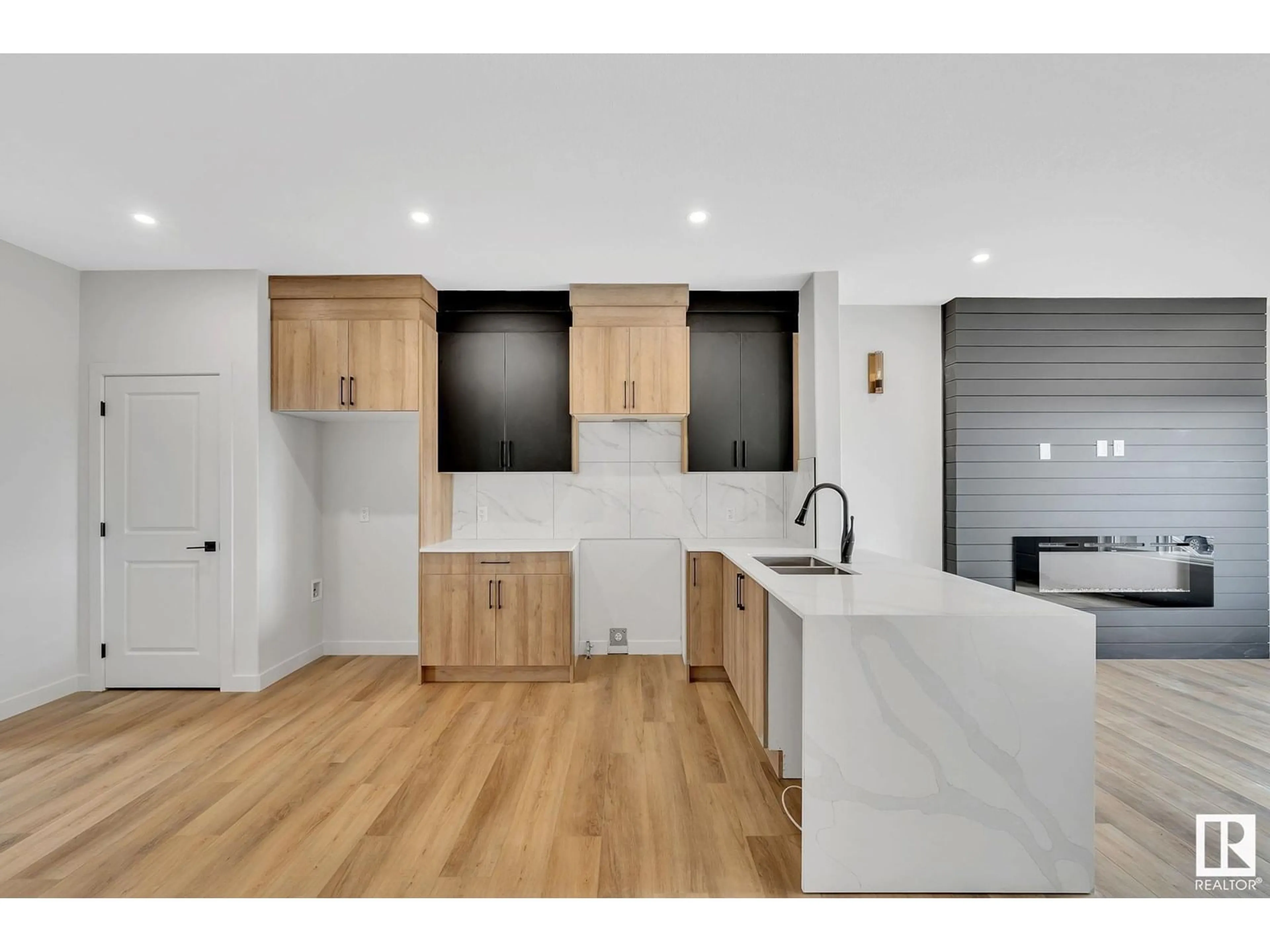 Open concept kitchen, wood/laminate floor for NW - 252 24 ST, Edmonton Alberta T6X3J1