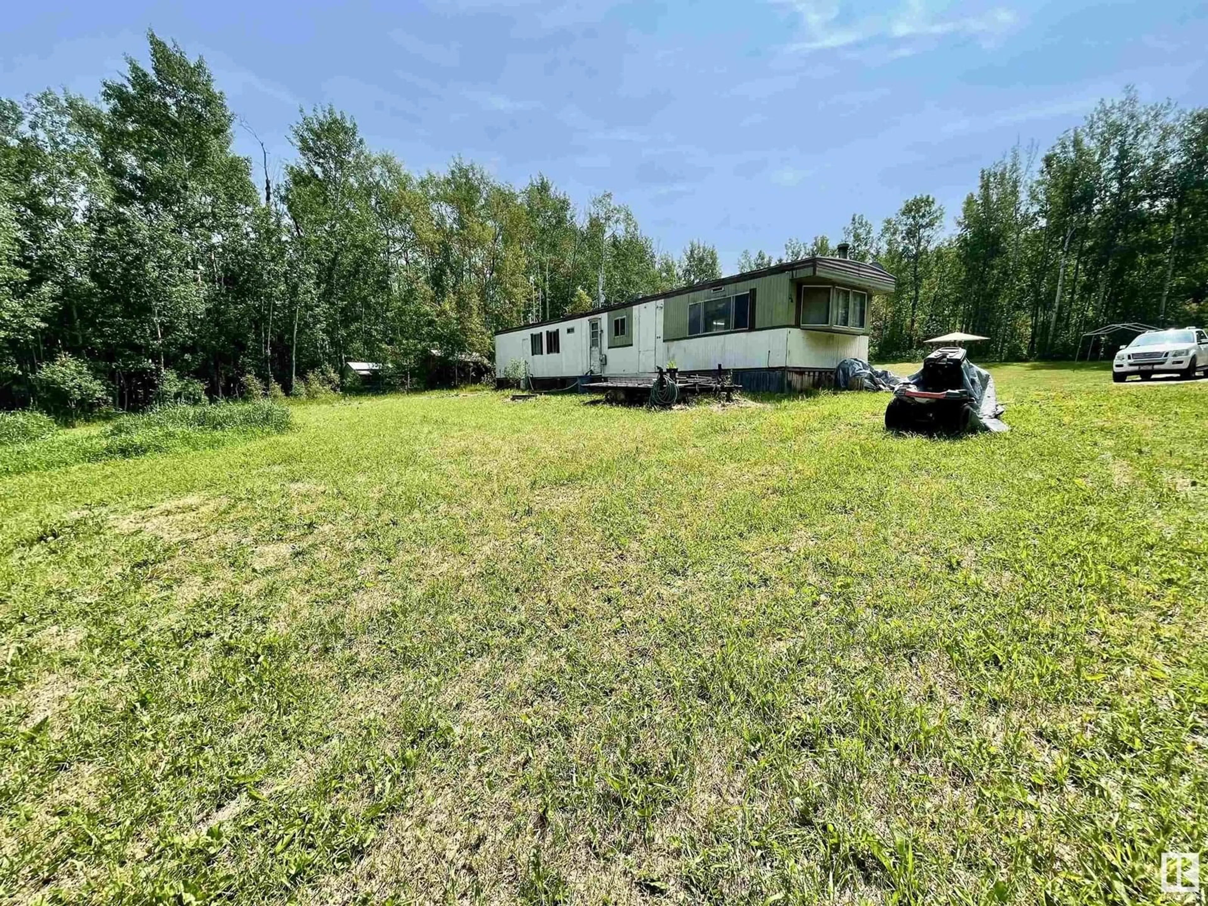 A pic from outside/outdoor area/front of a property/back of a property/a pic from drone, unknown for 6 - 453041 HWY 771, Rural Wetaskiwin County Alberta T0C2V0