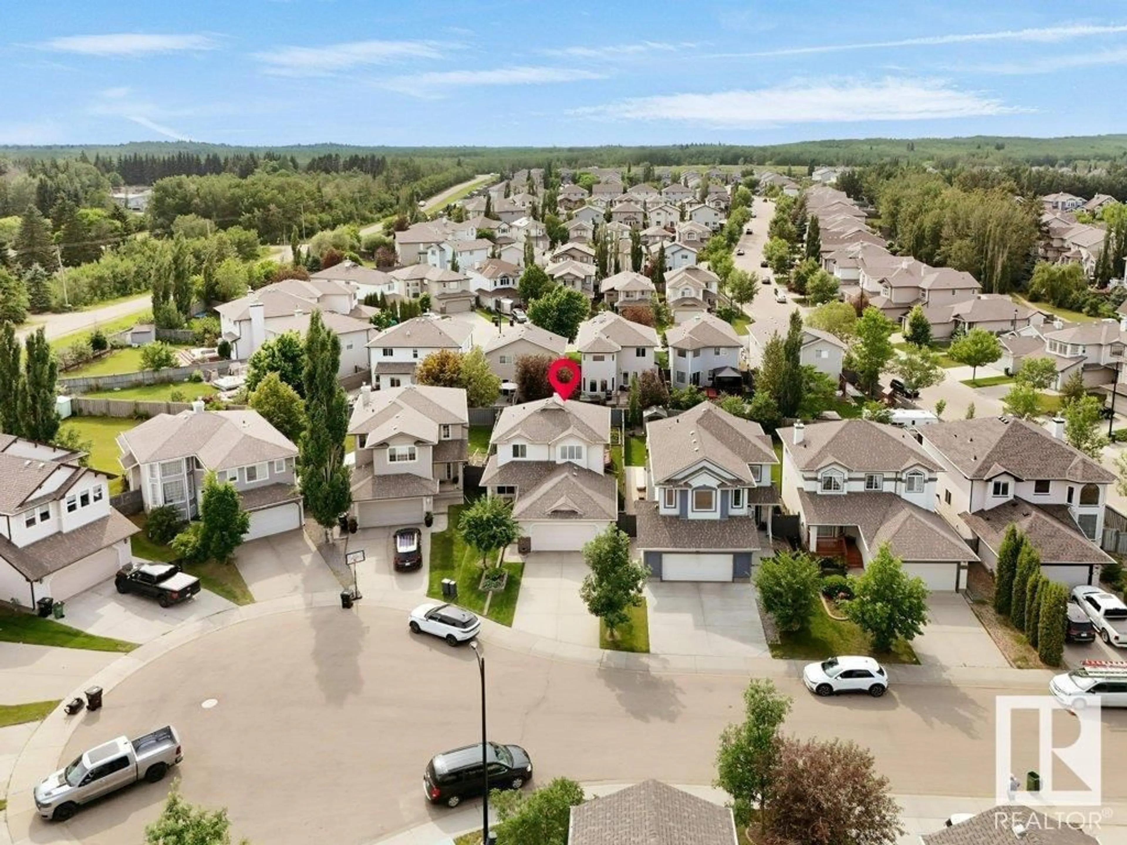 A pic from outside/outdoor area/front of a property/back of a property/a pic from drone, street for NW - 4520 210 ST, Edmonton Alberta T6M0G5