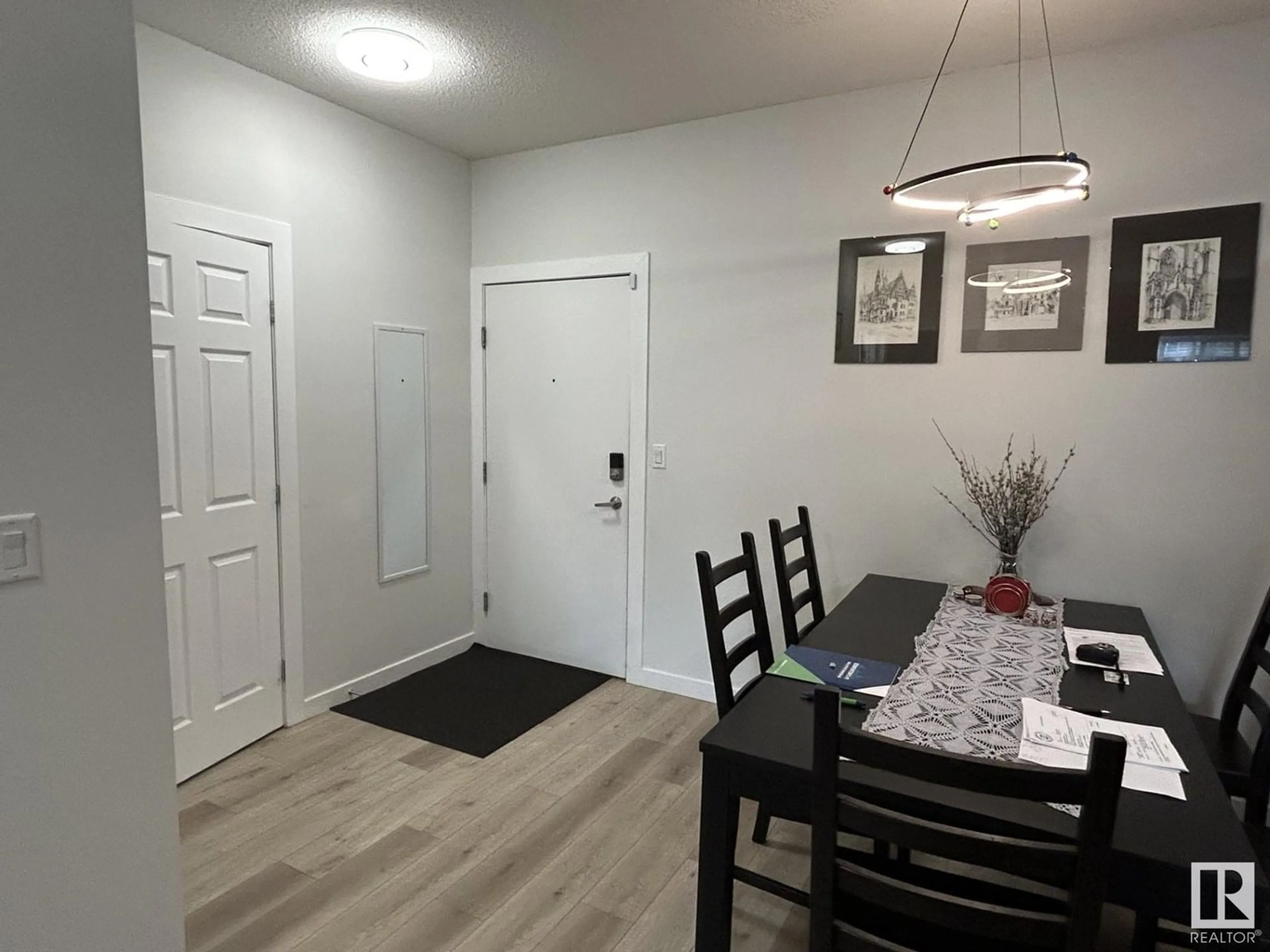 Dining room, wood/laminate floor for 317 - 263 MACEWAN RD, Edmonton Alberta T6W0C4