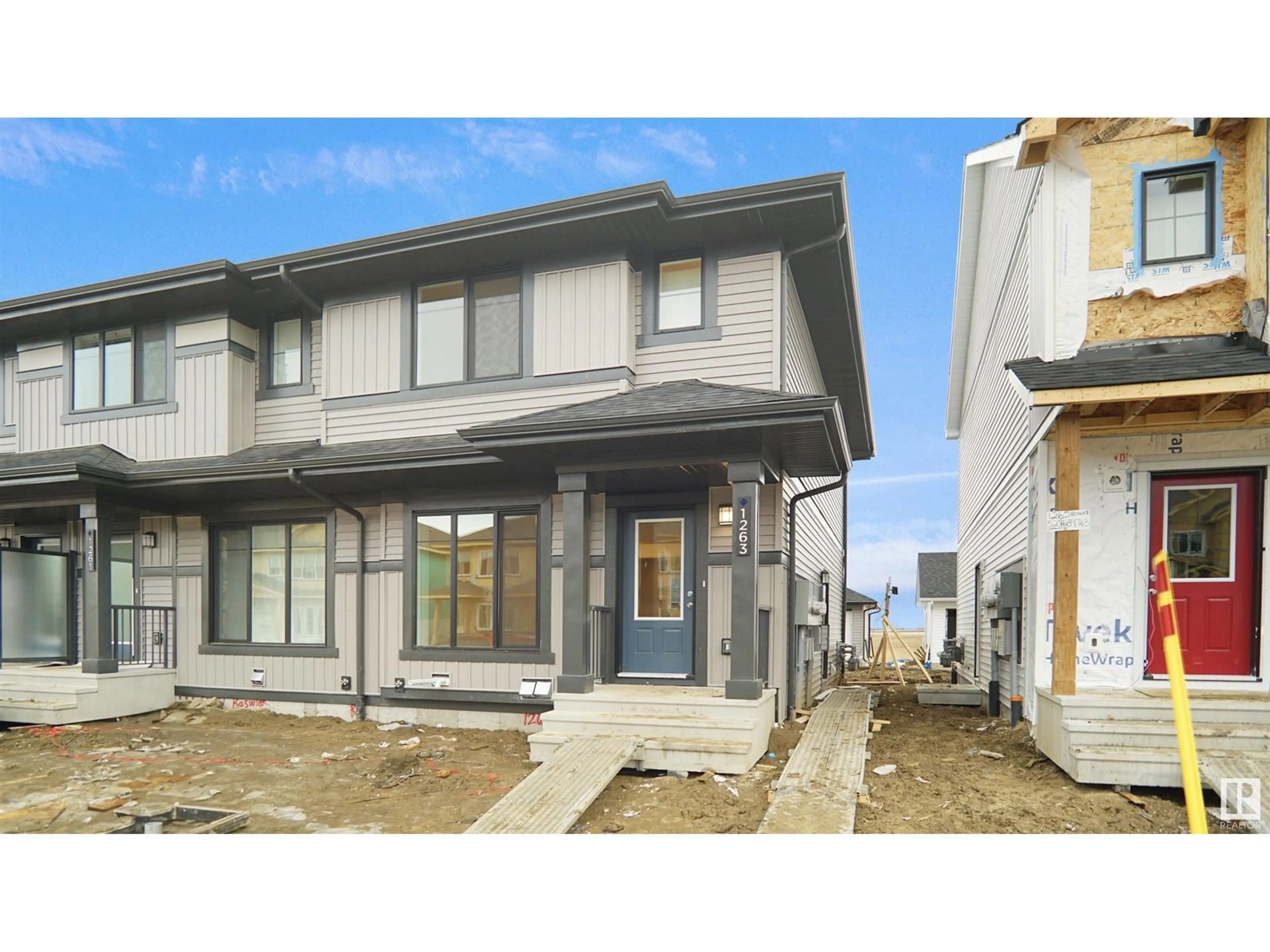 Home with vinyl exterior material, street for 1271 KESWICK DR, Edmonton Alberta T6W5G5
