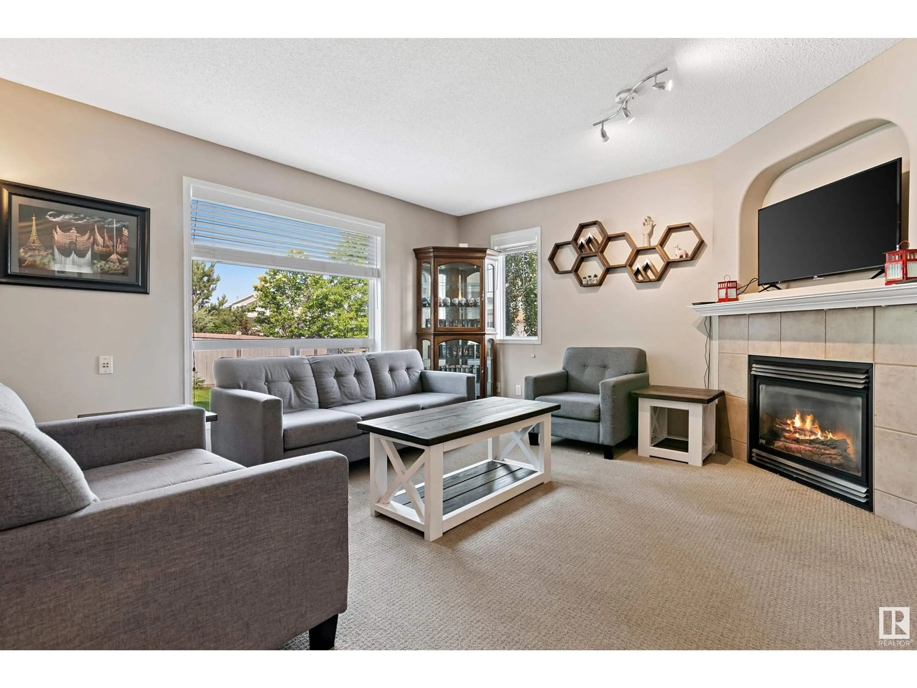 Living room with furniture, unknown for 102 SUNFLOWER LN, Sherwood Park Alberta T8H2M3