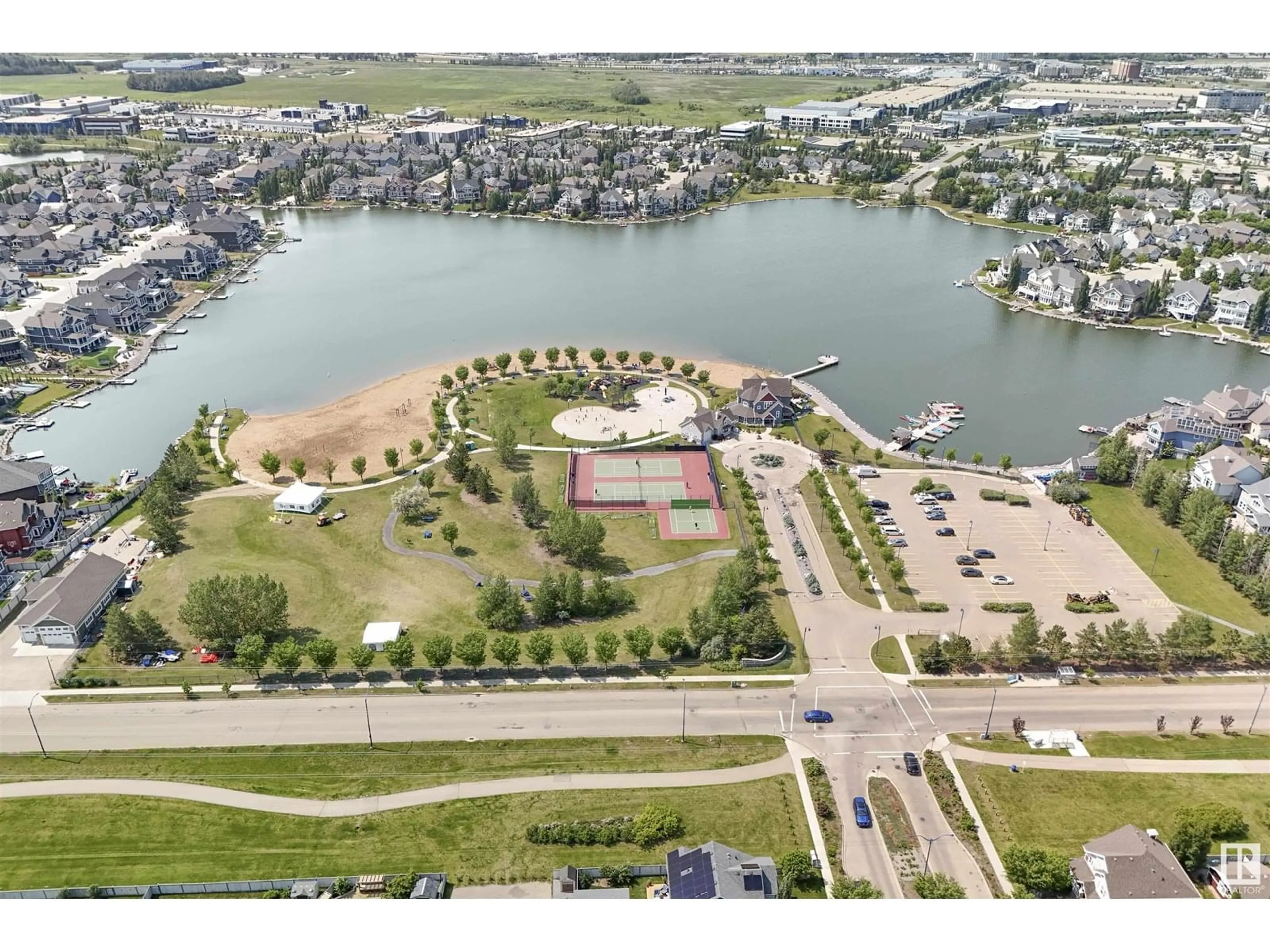 A pic from outside/outdoor area/front of a property/back of a property/a pic from drone, water/lake/river/ocean view for #40 - 1179 SUMMERSIDE DR, Edmonton Alberta T6X1K1