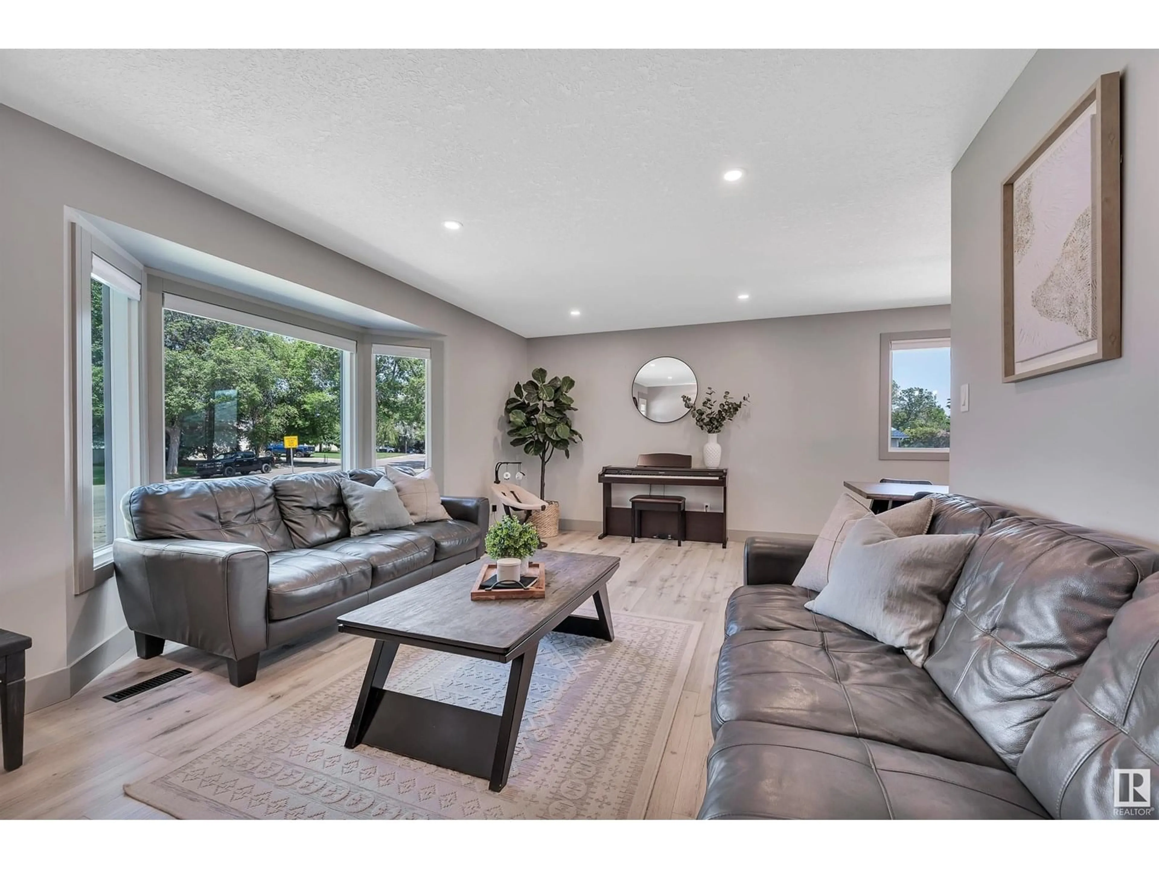 Living room with furniture, wood/laminate floor for 550 ALDER AV, Sherwood Park Alberta T8A1T2