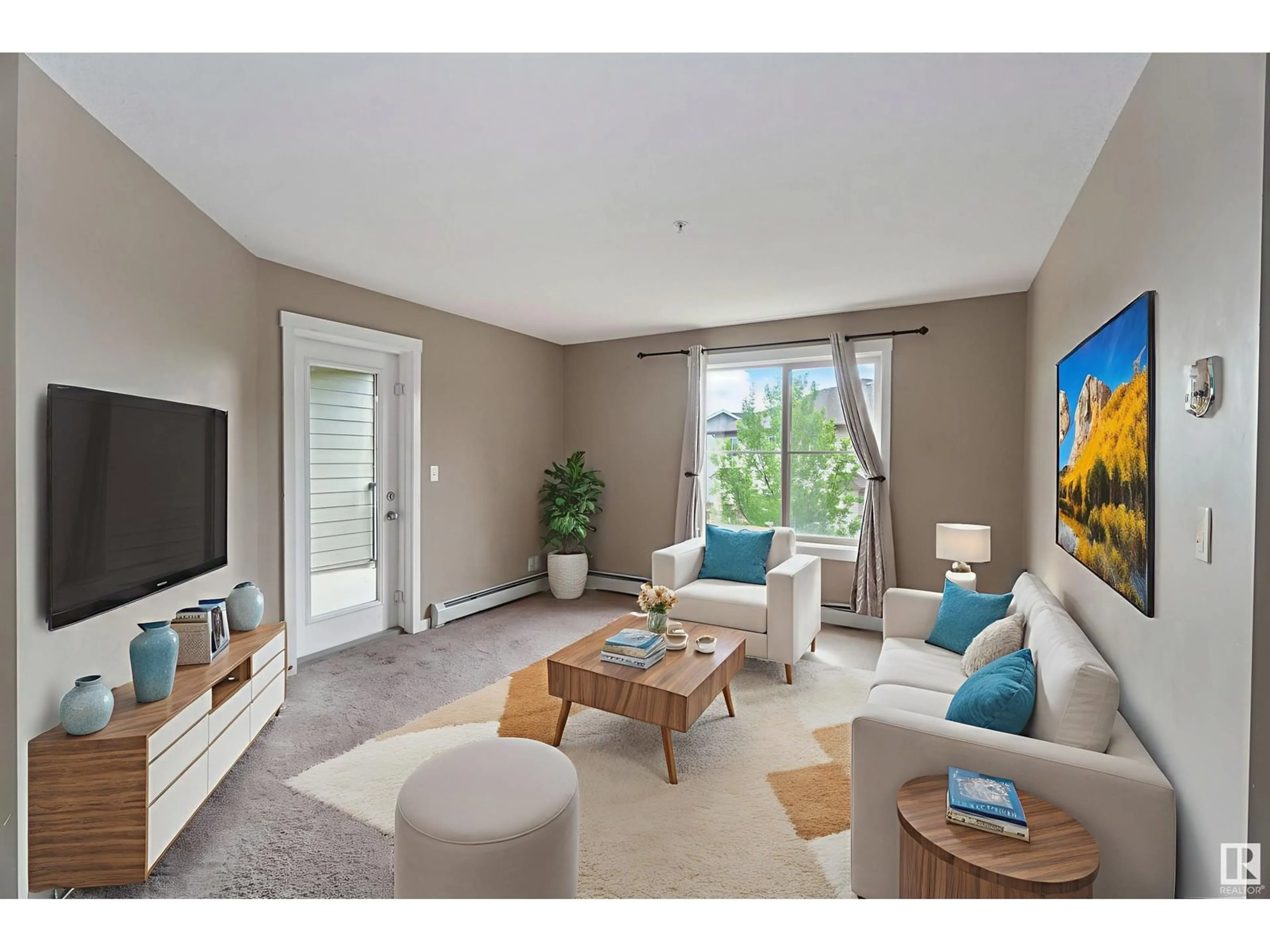 Living room with furniture, unknown for 207 - 3207 JAMES MOWATT TRAIL SW, Edmonton Alberta T6W3L6