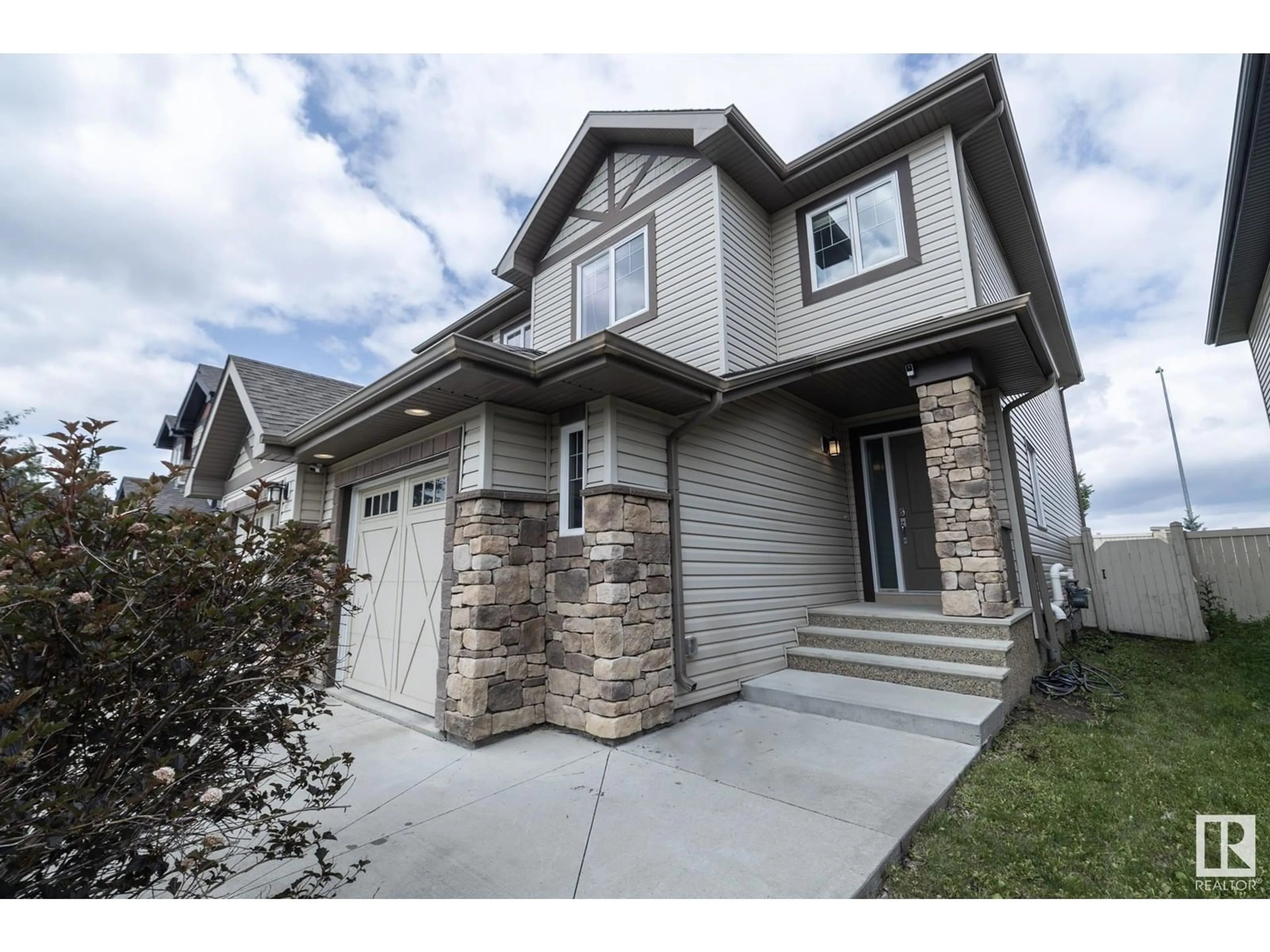 Home with vinyl exterior material, street for SW - 16116 10 AV, Edmonton Alberta T6W2G9