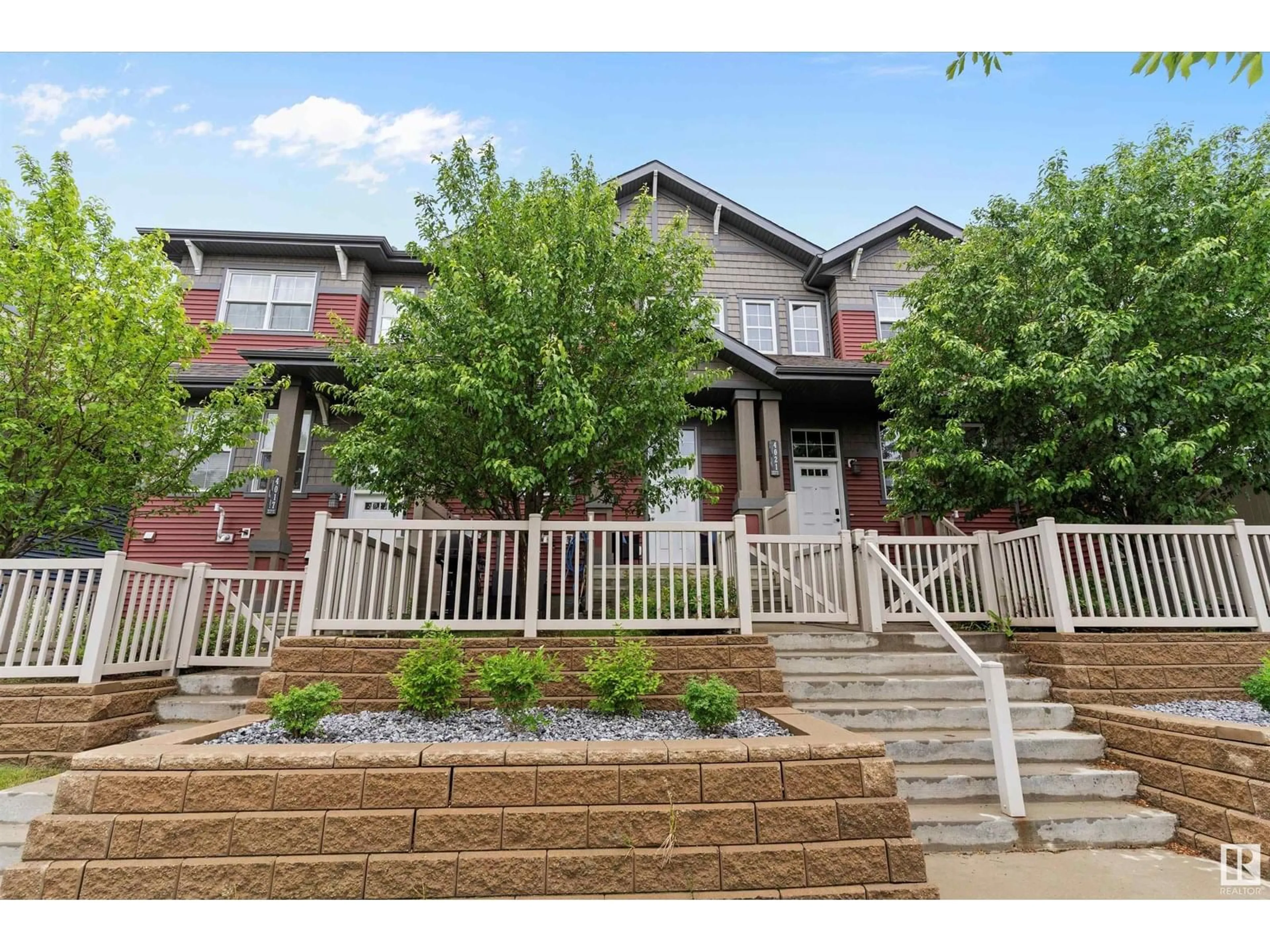 Home with brick exterior material, street for 4019 ORCHARDS DR, Edmonton Alberta T6C1V2