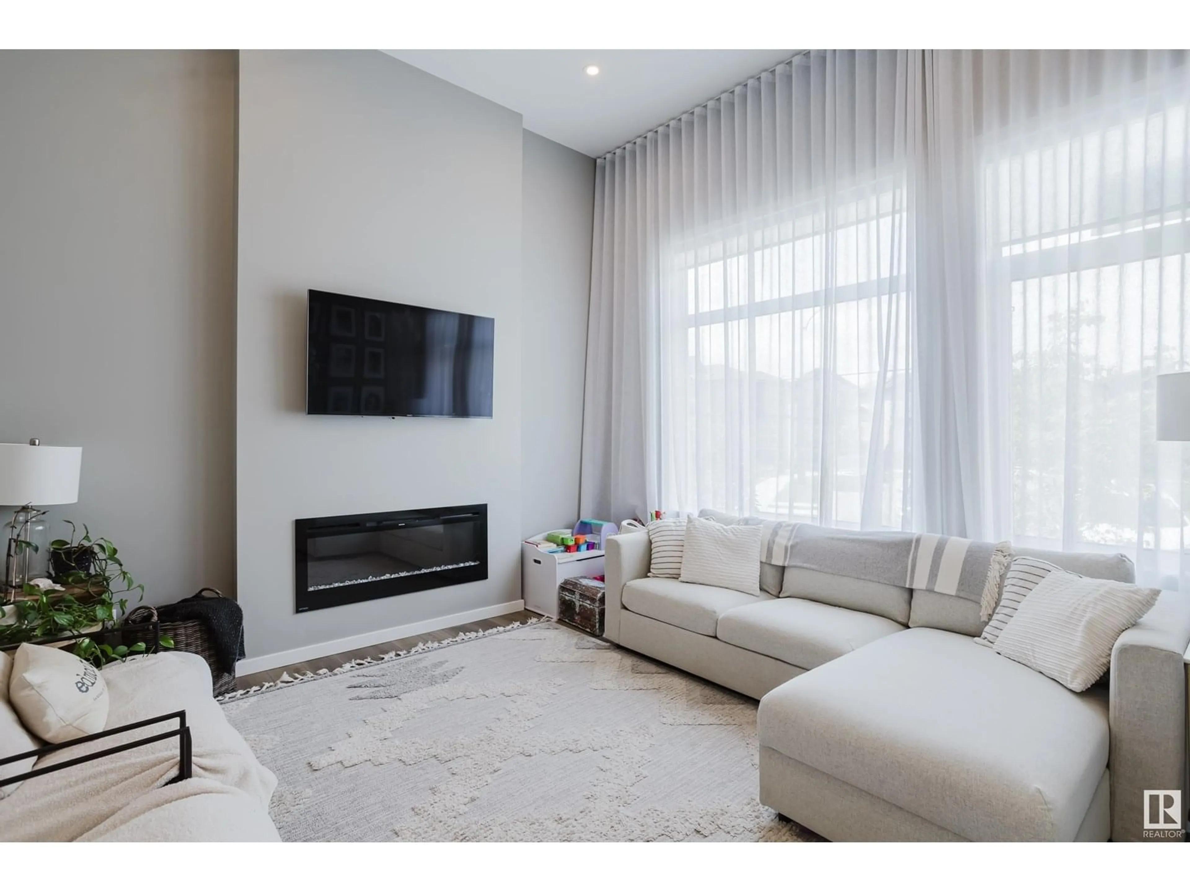 Living room with furniture, unknown for 411 37 AV, Edmonton Alberta T6T2L7